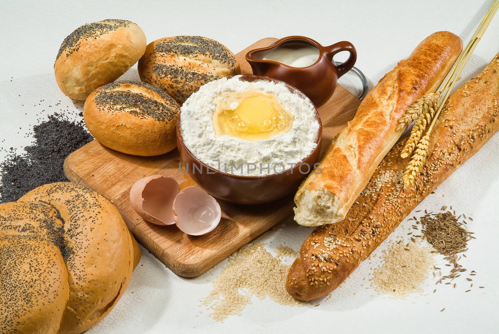 Different kinds of bread on a studio background