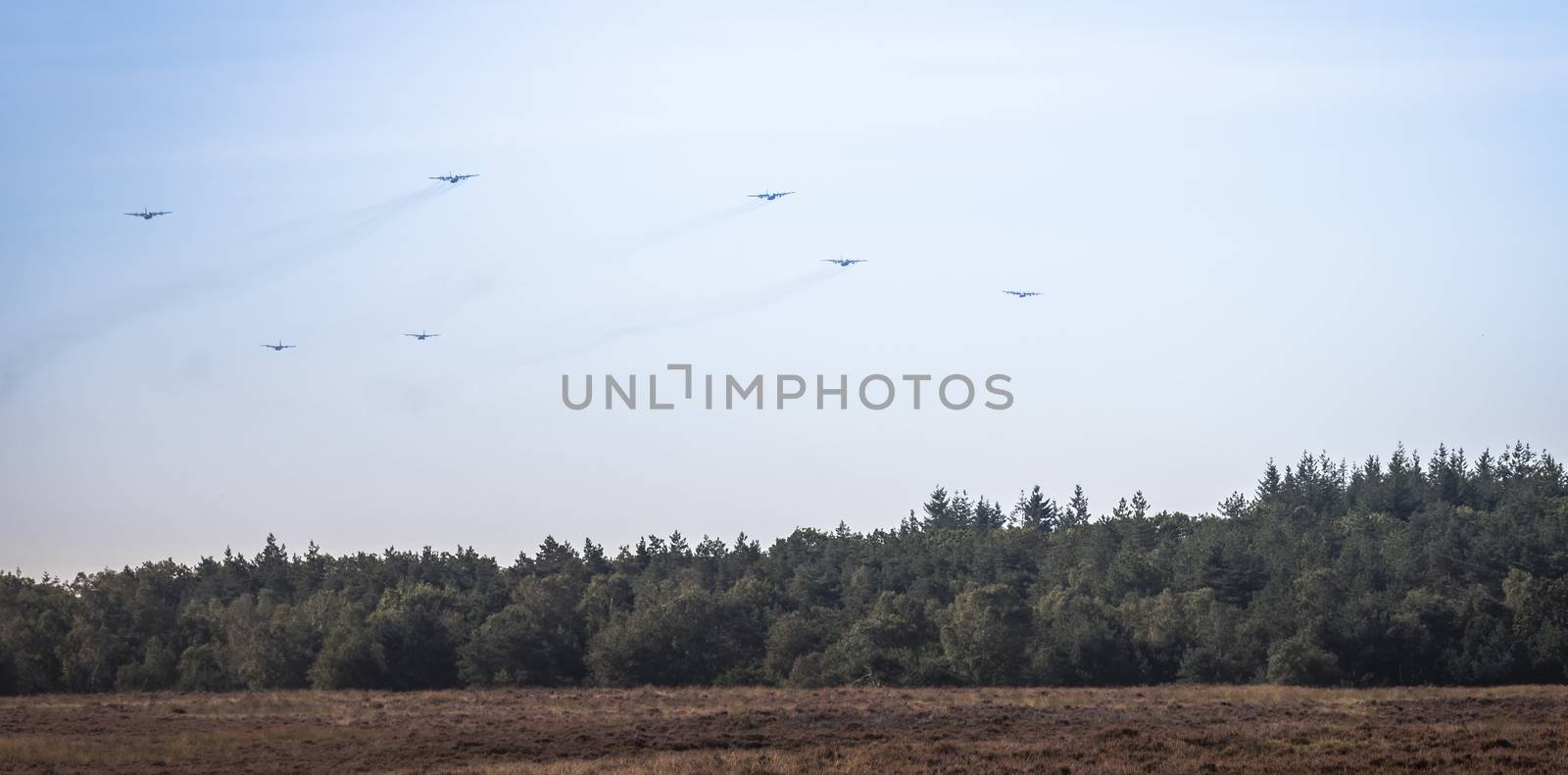 Ede,20-sep-2019:the dakota and hercules planes are approaching the heathland for dropping the paratroopers on the occasion of operation airborn, commemoration of market garden