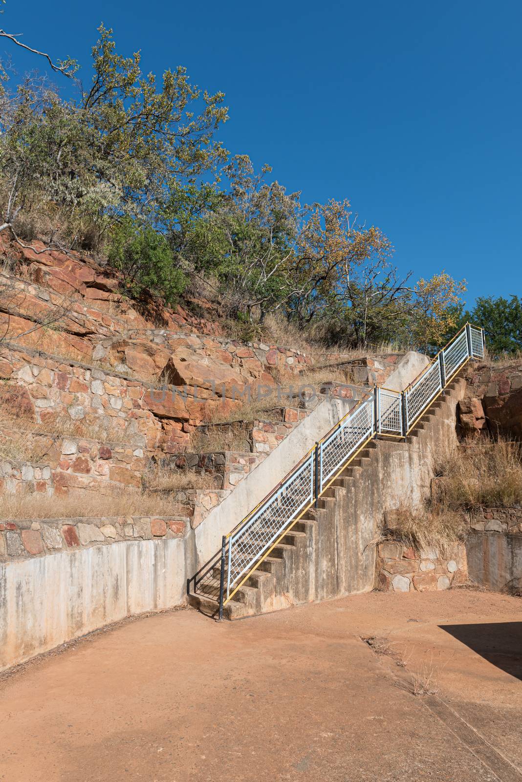 Stairs leading to and from the Blyderivierspoort Dam wall by dpreezg