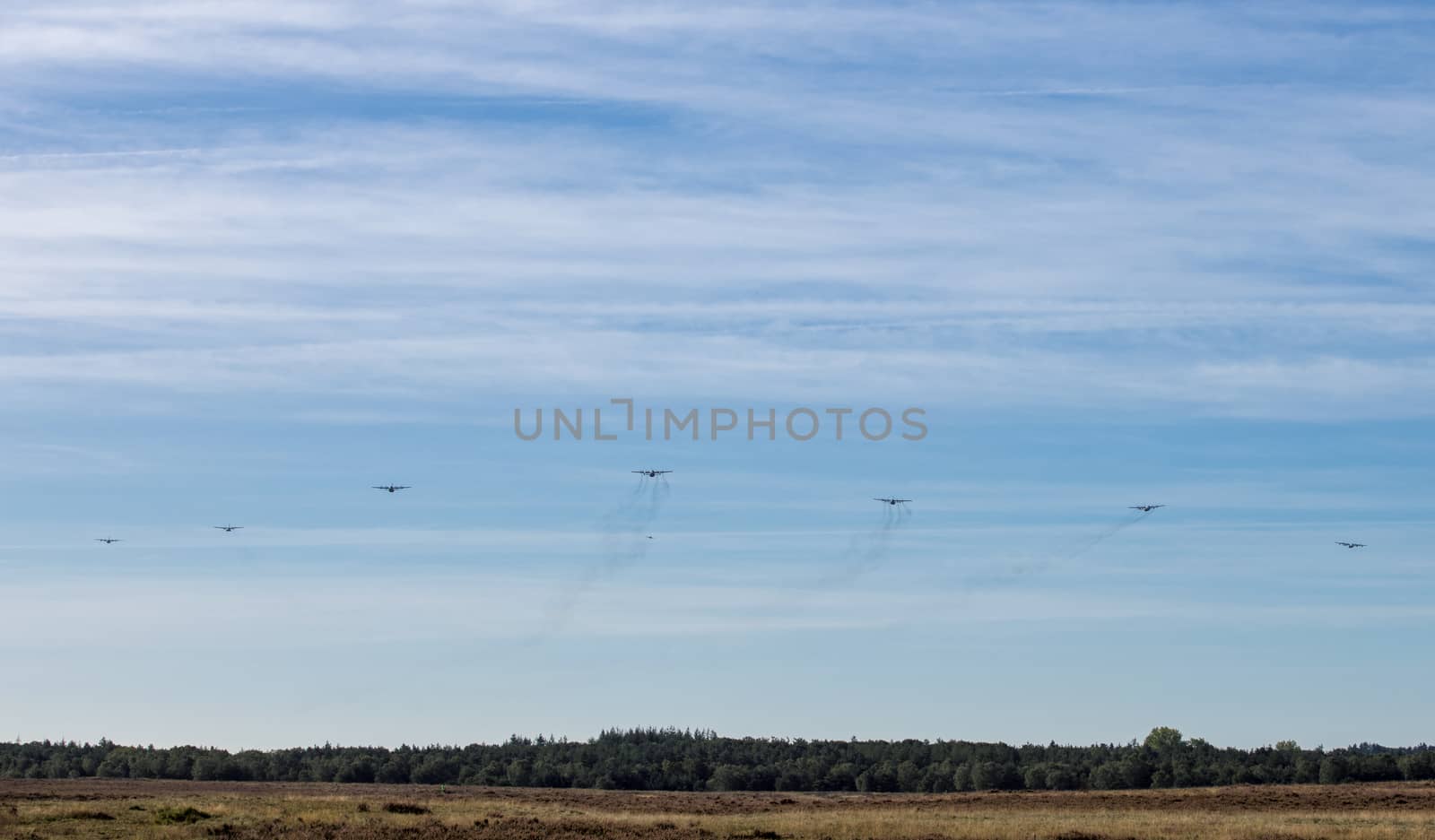 Ede,20-sep-2019:the dakota and hercules planes are approaching the heathland for dropping the paratroopers on the occasion of operation airborn, commemoration of market garden