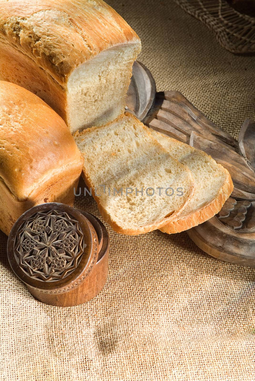 Different kinds of bread on a studio background