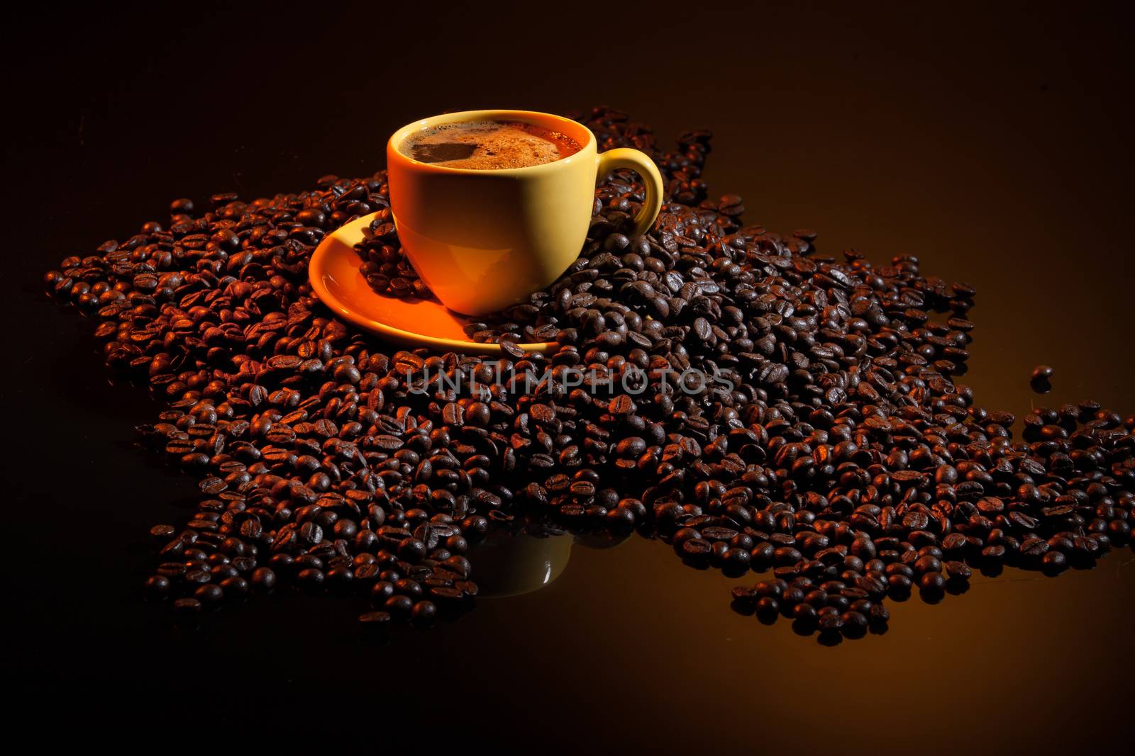 Coffee and coffee beans ona studio background
