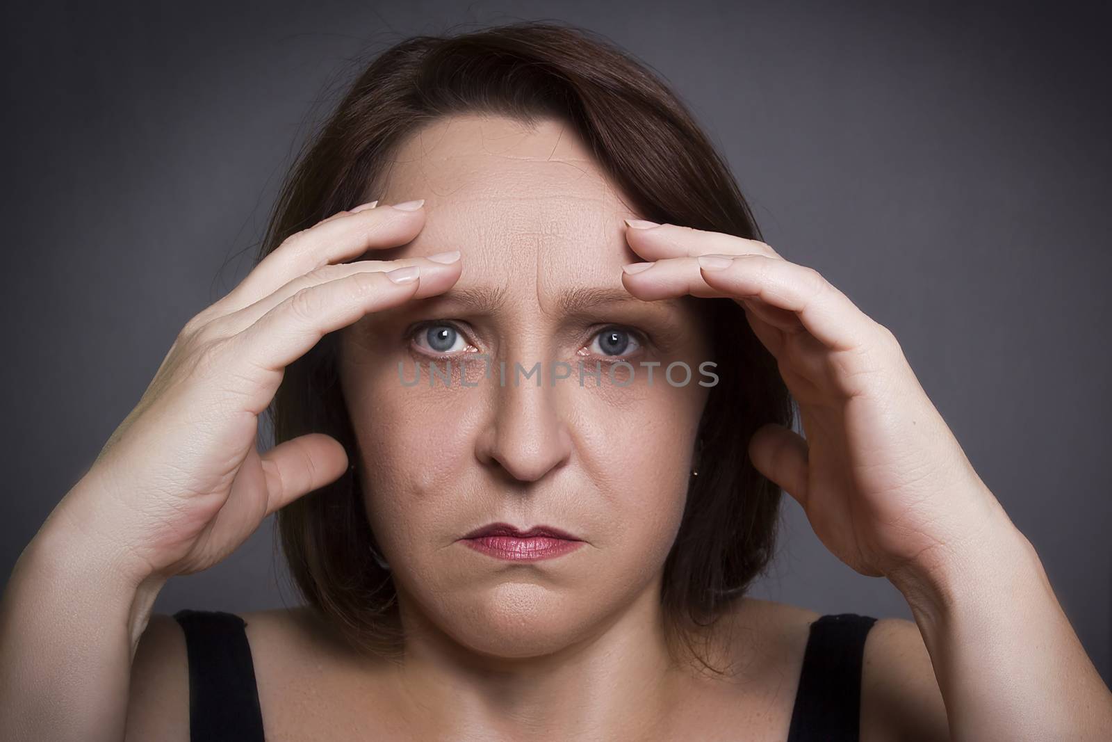 Woman having headache by VIPDesignUSA