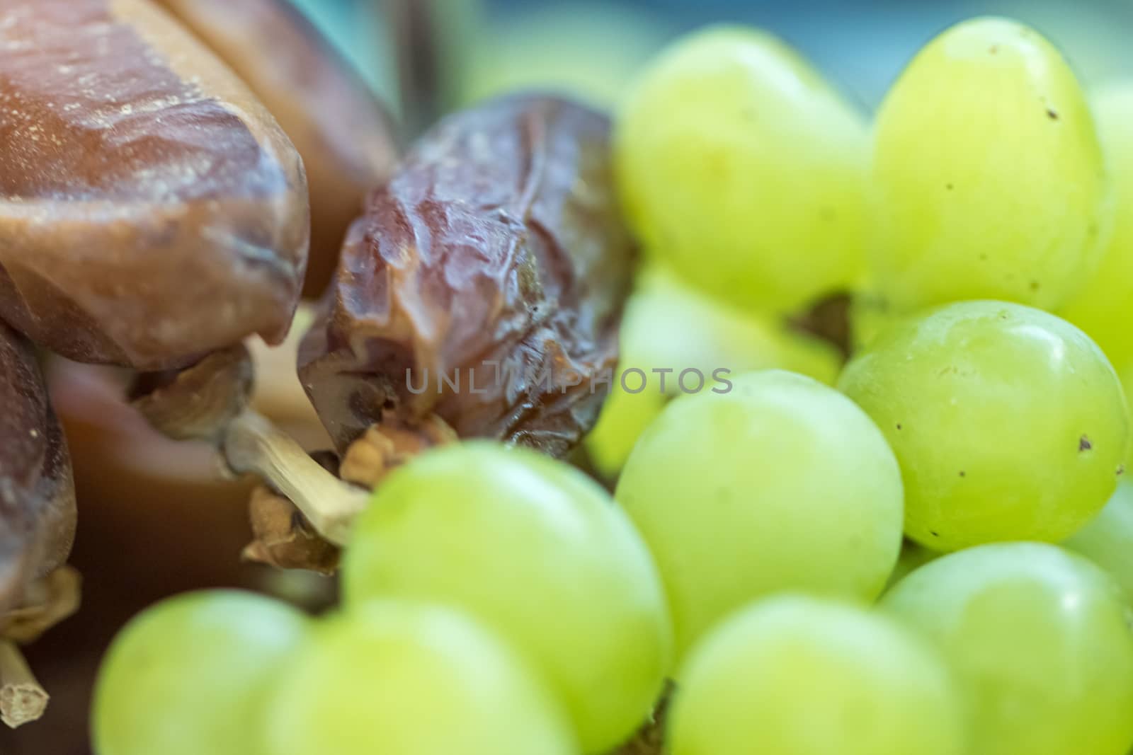 close up view of grapefruits and dates with natural light