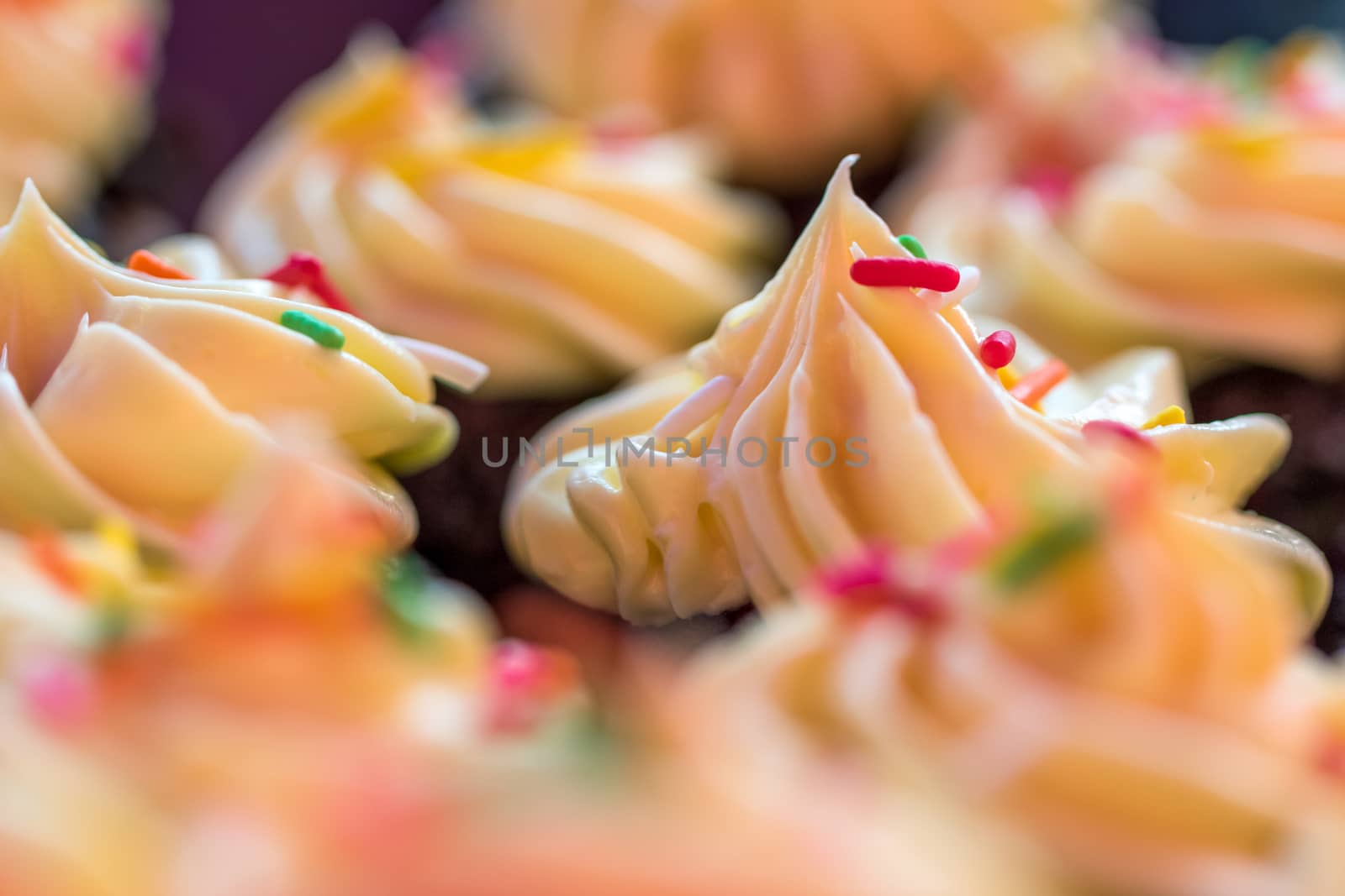 close up shot of cupcakes topping