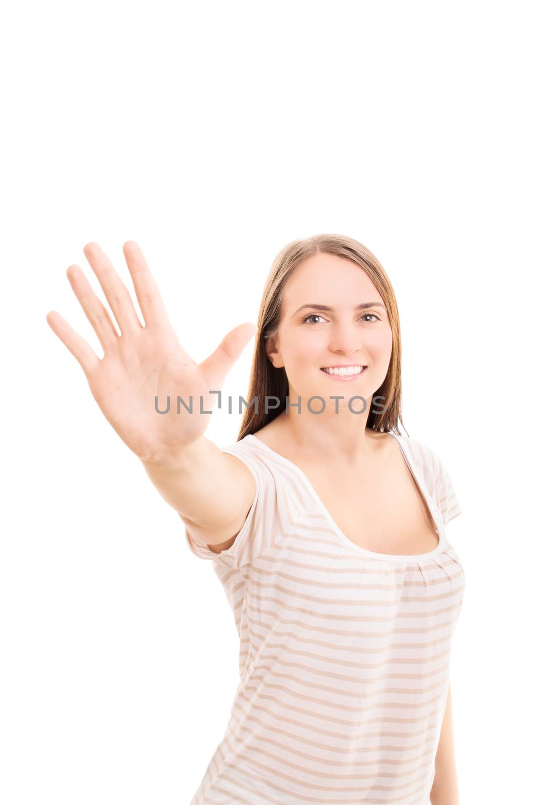 Beautiful smiling young girl holding her hand up making a high five gesture, isolated on white background.
