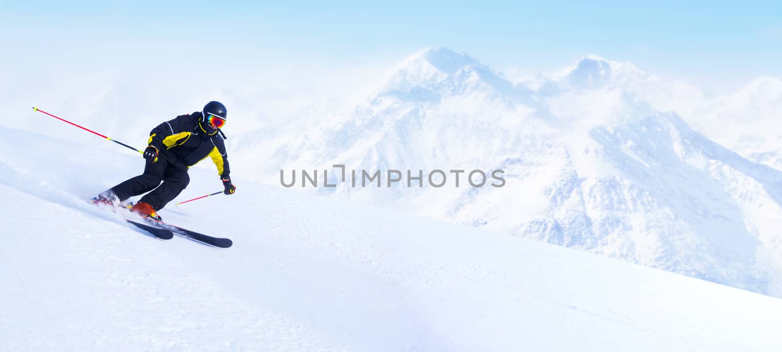 Skier in high mountains by destillat