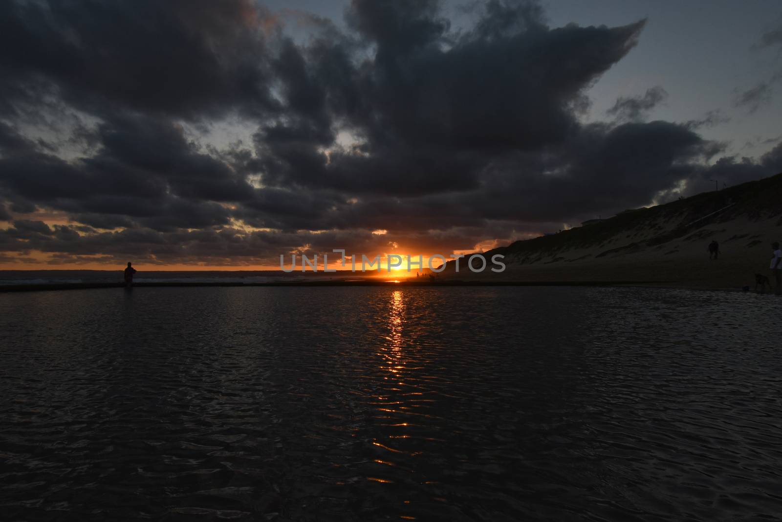 Late Afternoon Beach Sunset Over Tide Pool by jjvanginkel