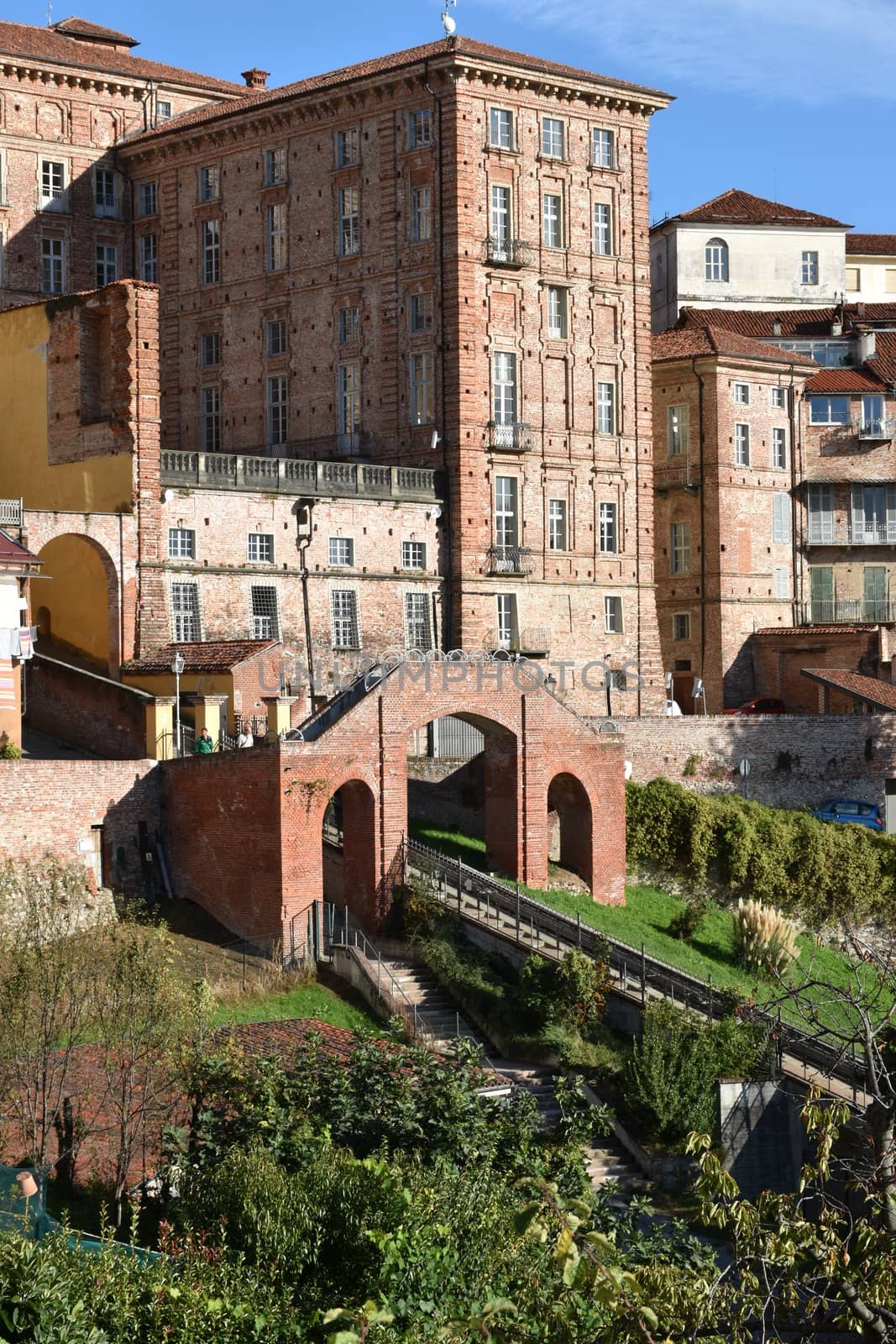 This photo represents a old medieval buildings of Mondovi Piazza with rails of funicolare.