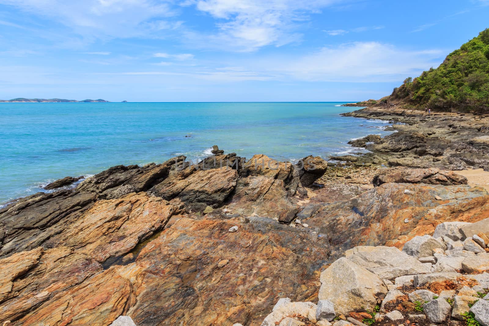 Sky with beautiful beach with rocks and tropical sea in Thailand.