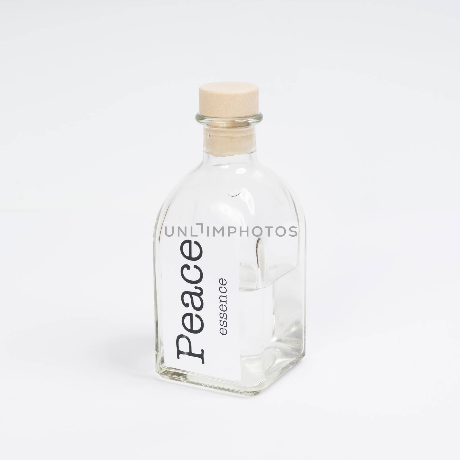a glass bottle containing Peace essence