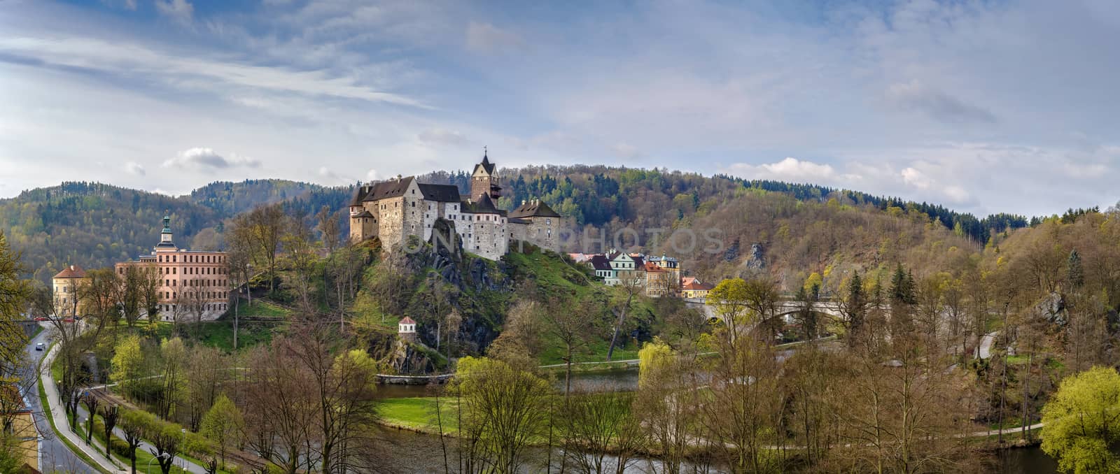 Loket Castle is a 12th-century Gothic style castle about 12 kilometres from Karlovy Vary on a massive rock in the town of Loket, Czech Republic.