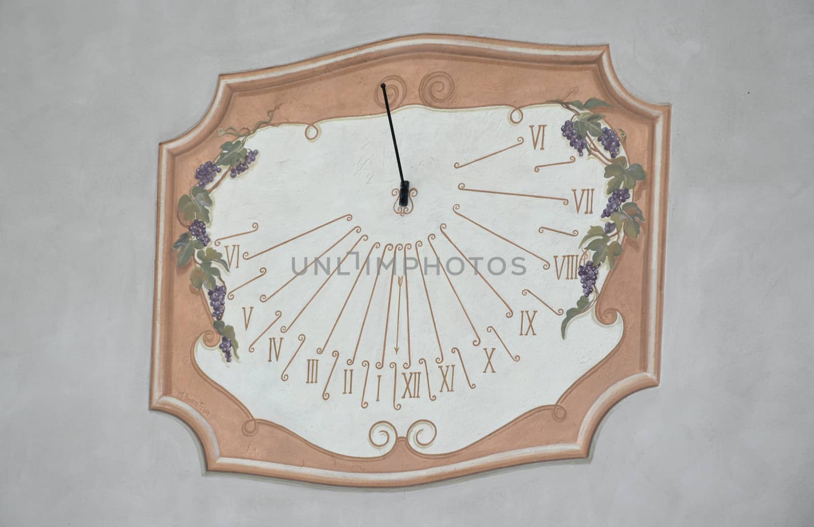 Sundial painted with pastel colors