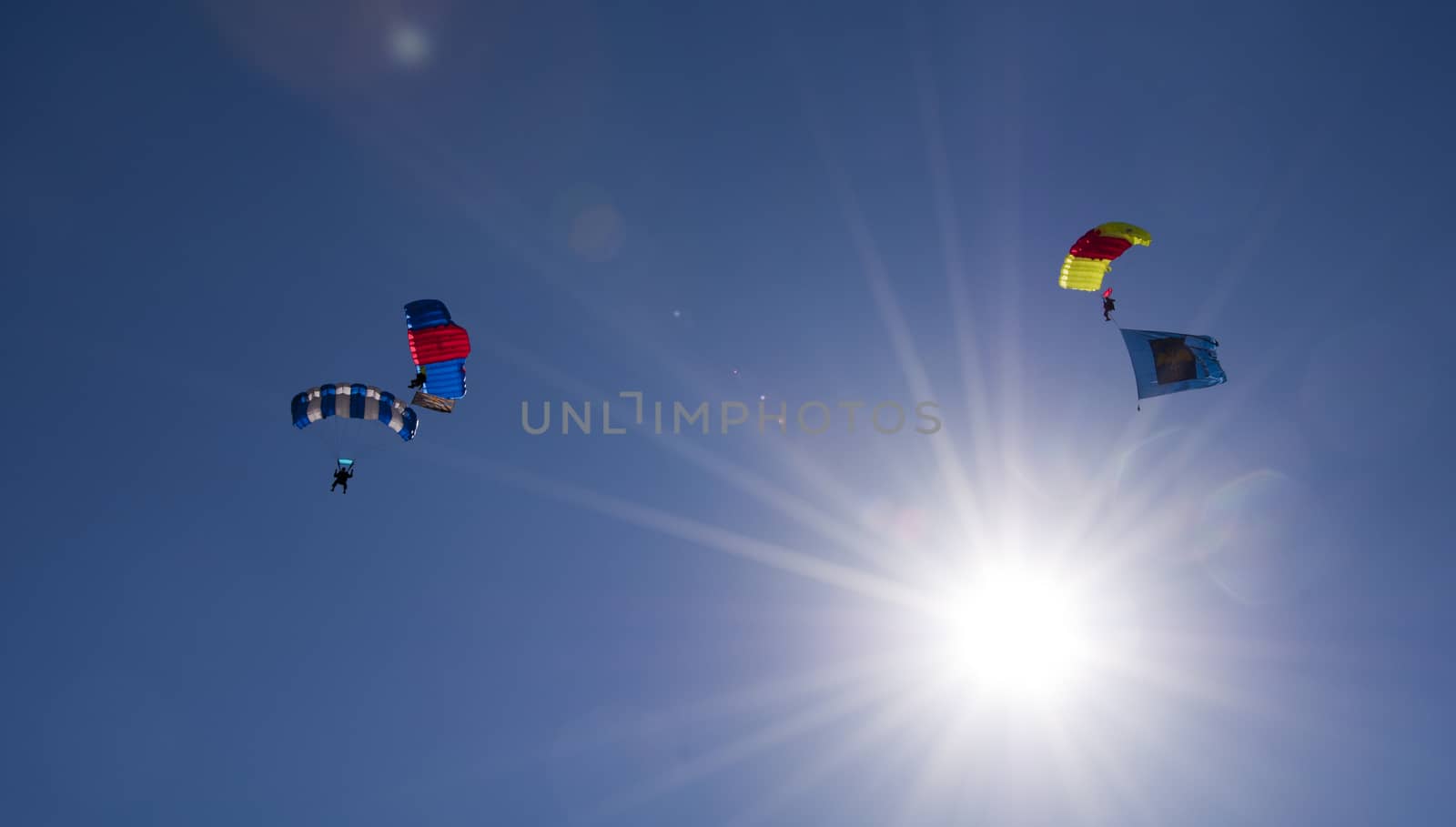 Paraglider flies paraglider in the sky. Paragliding. by marynkin