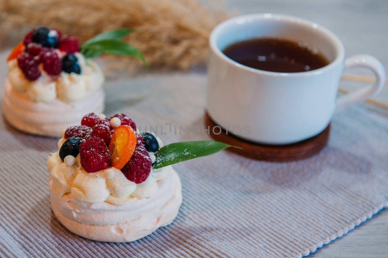 Pavlova meringue cake with cream and small fruits by marynkin