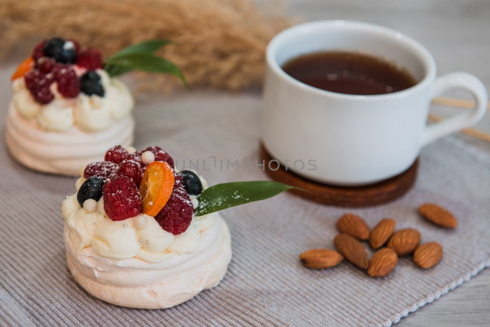 Pavlova meringue cake with cream and small fruits by marynkin