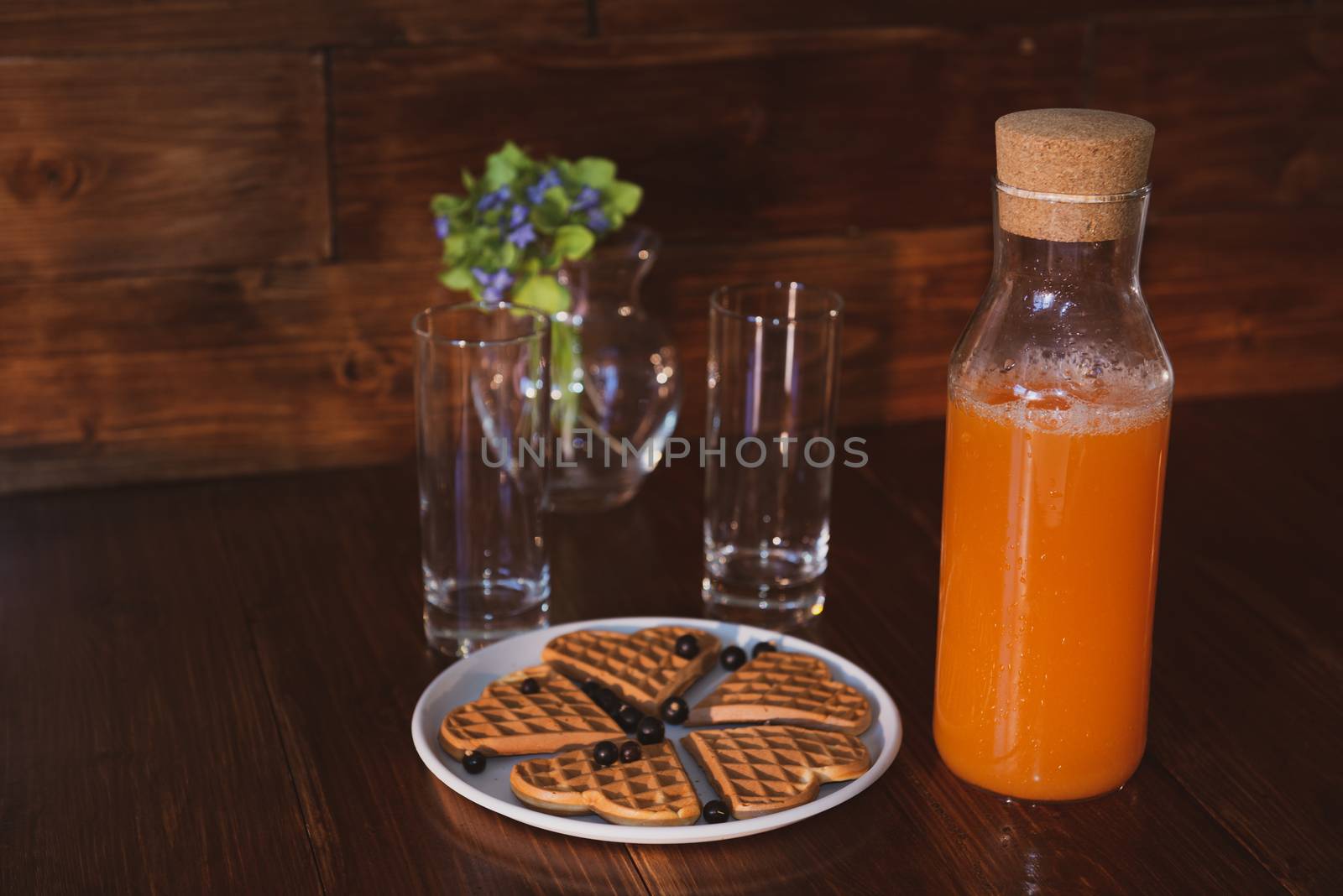 breakfast for two. freshly squeezed juice and wafers by marynkin