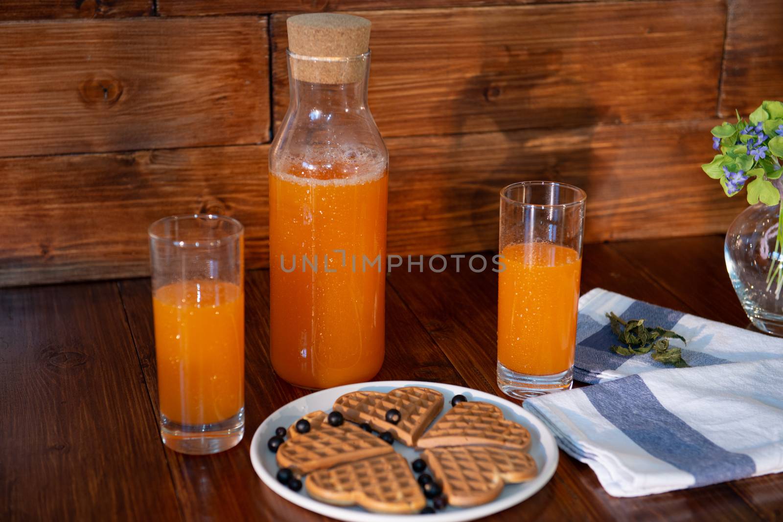breakfast for two. freshly squeezed juice and wafers by marynkin