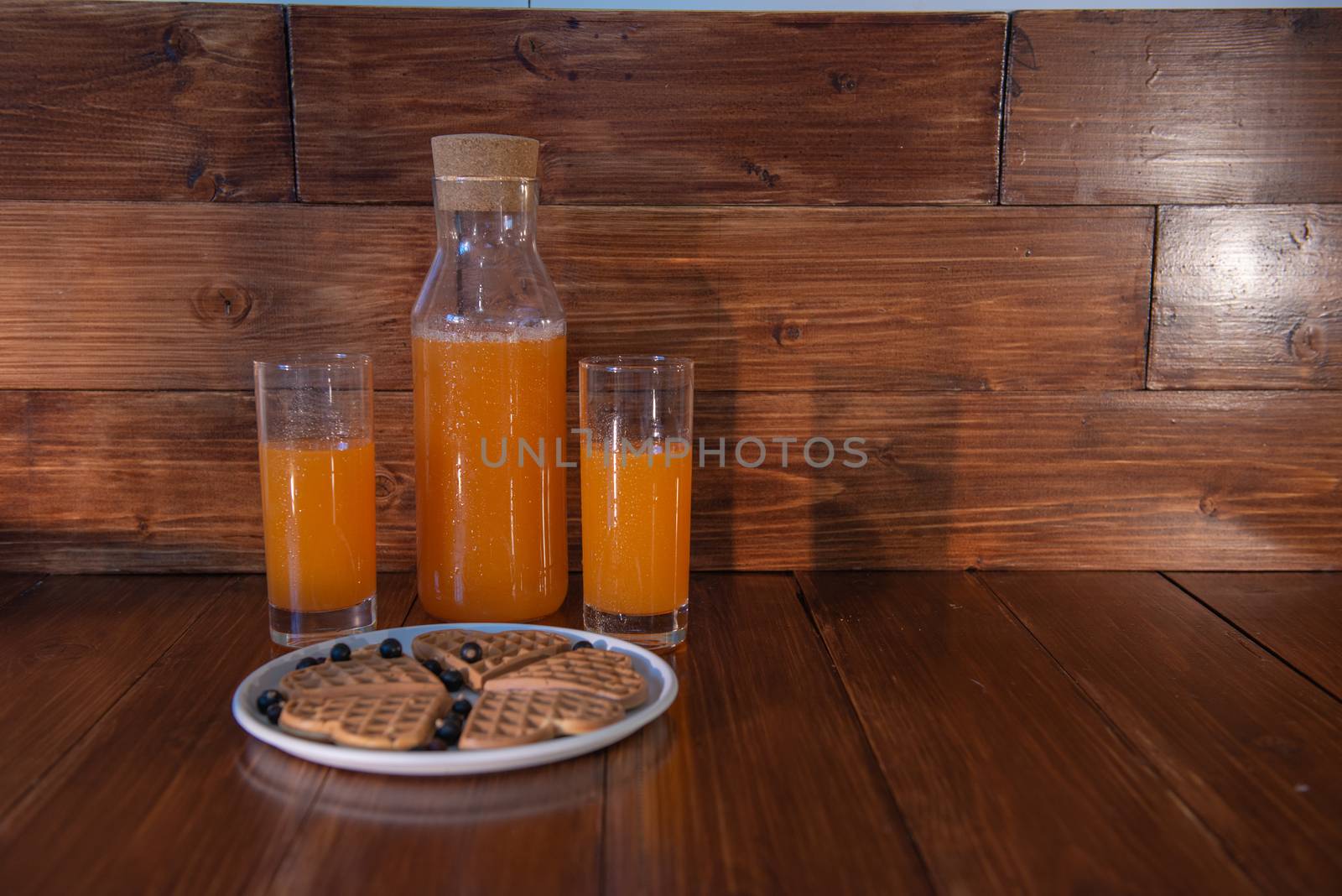 breakfast for two. freshly squeezed juice and wafers by marynkin