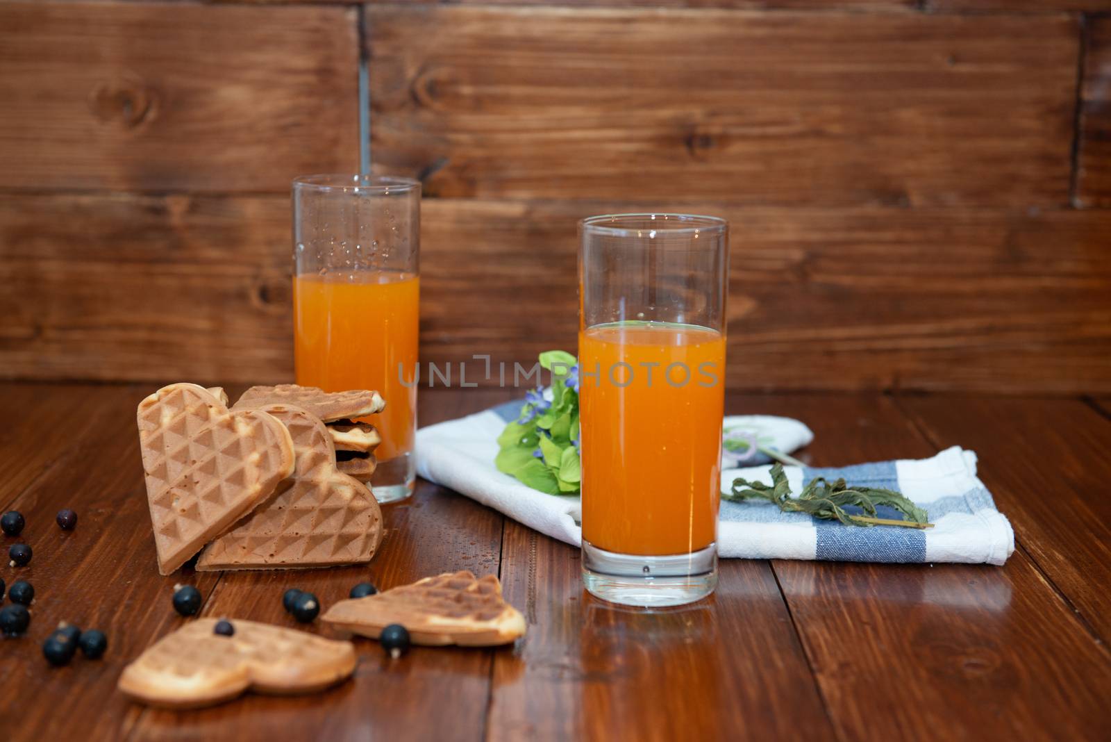 breakfast for two. freshly squeezed juice and wafers by marynkin