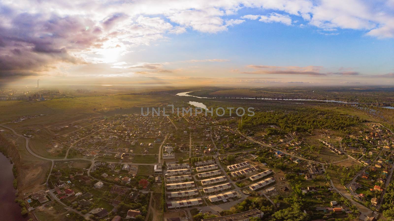 Aerial view on town. Beautiful morning and sunrise. Photo of the village at an altitude of 500 meters.