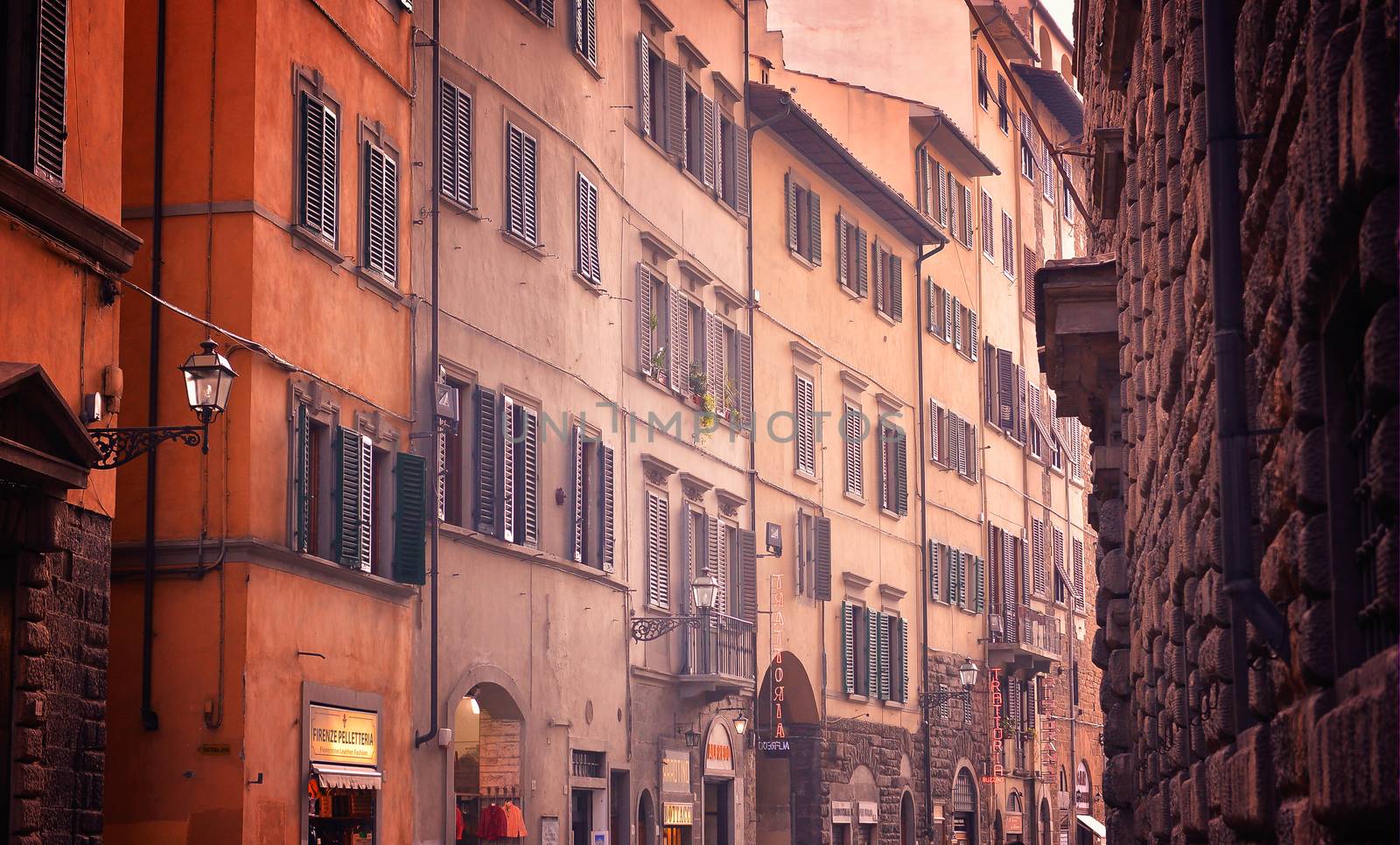 View of old street with many windows in Florence, Italy. Architecture and landmark of Italy.