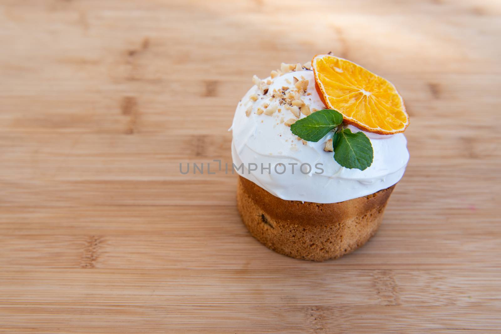 Easter, Easter cake on wooden background with a complex composition, beautiful scenery, dried fruits by marynkin