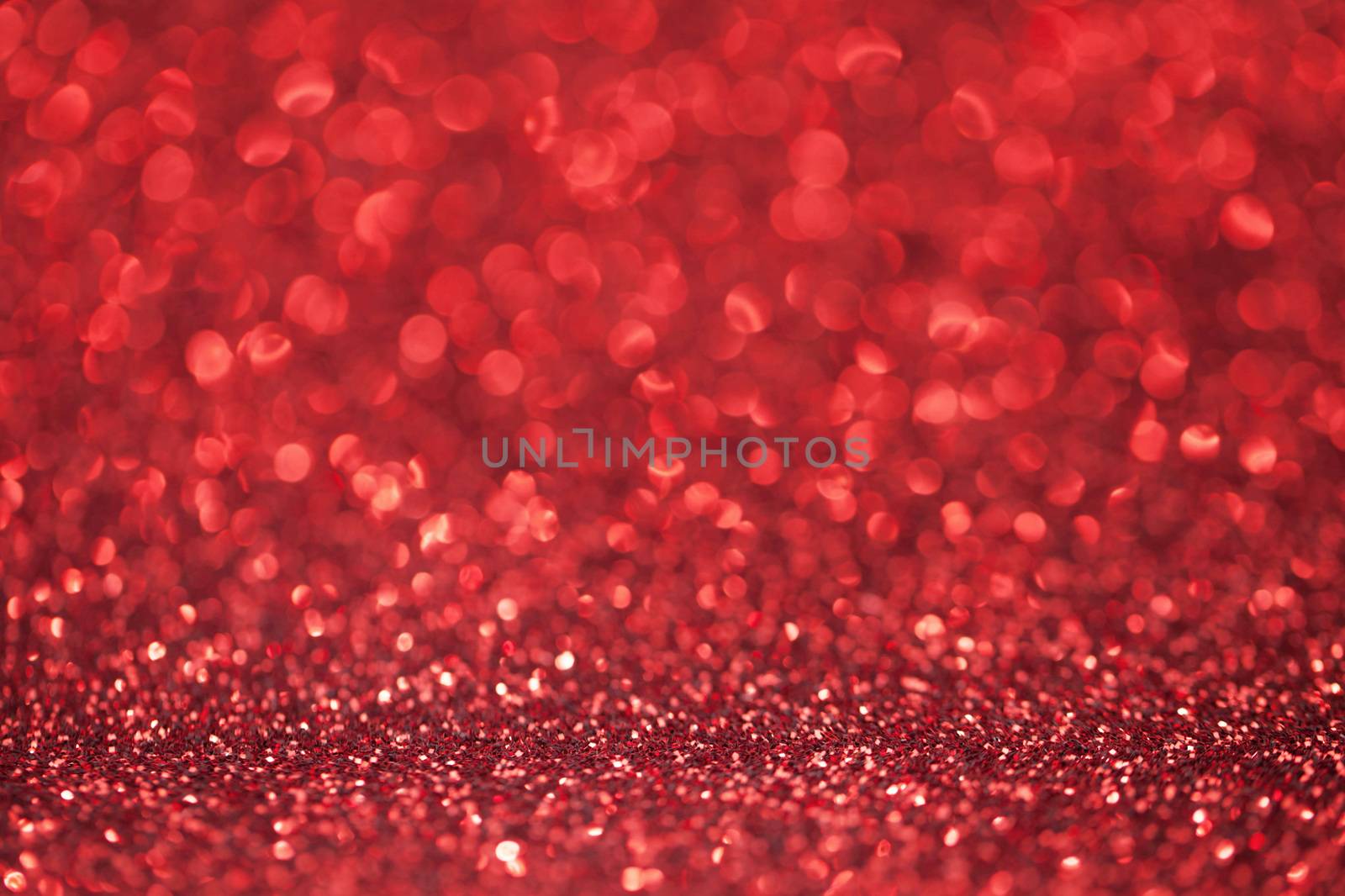 Abstract red glitter light bokeh holiday party background