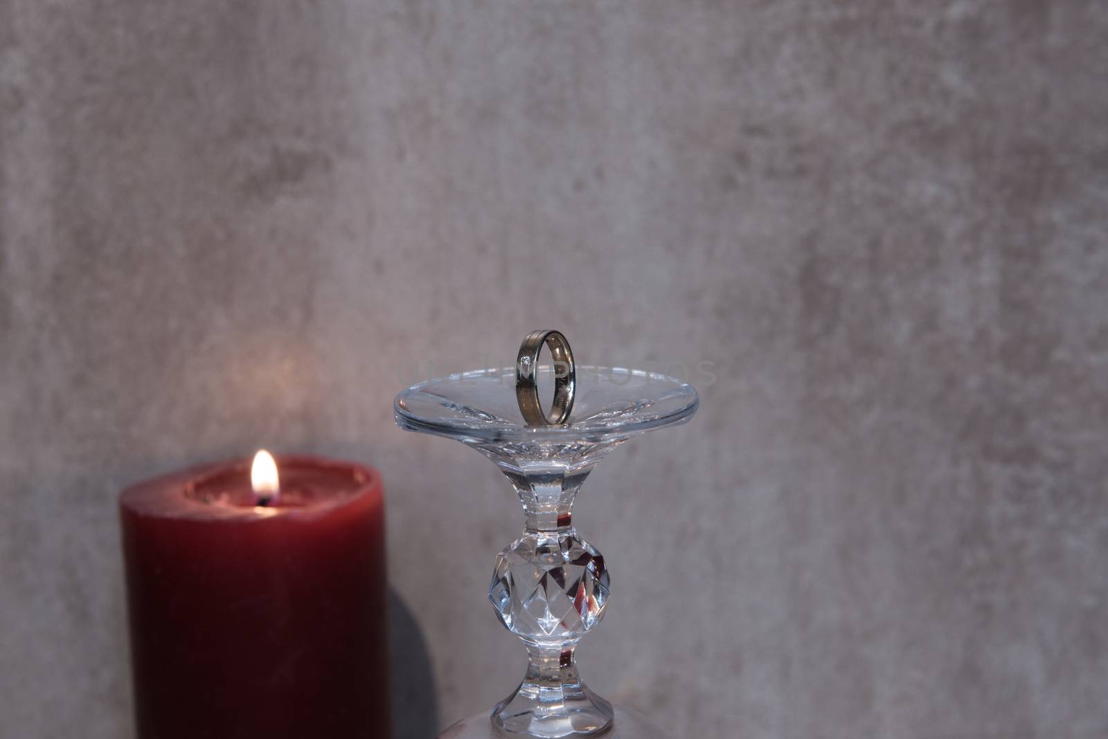 Golden wedding rings isolated on grey background. Romeo and Juliet