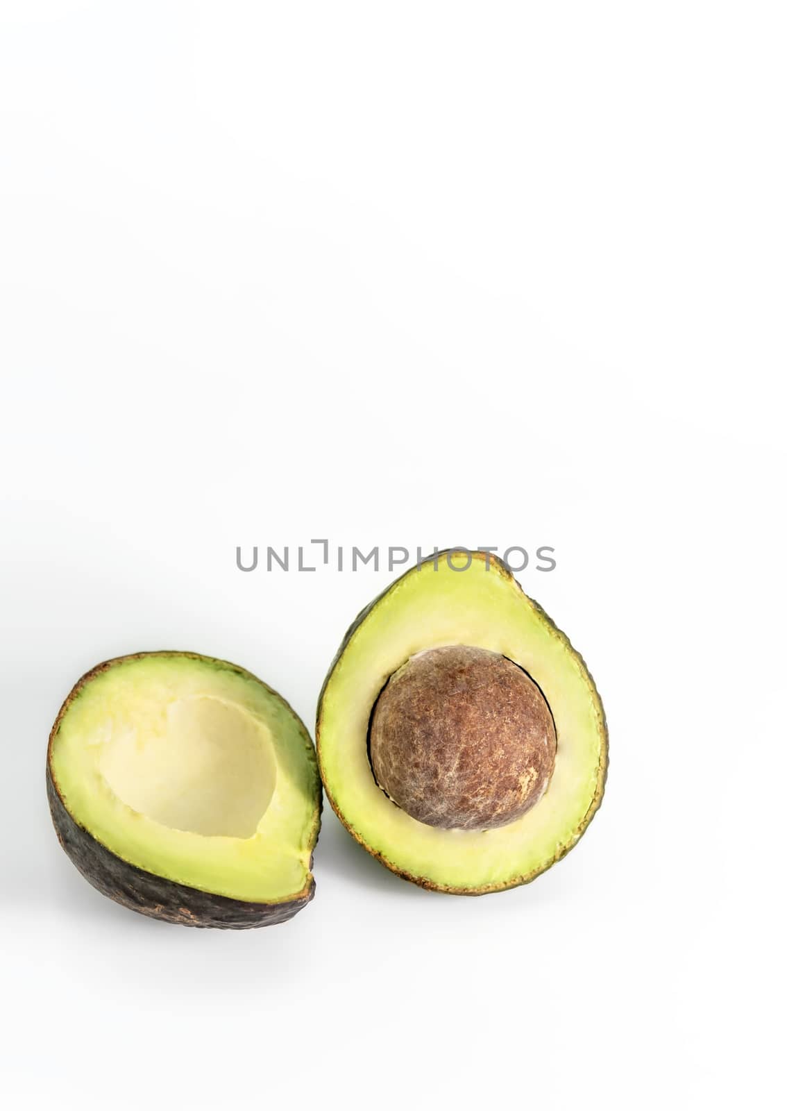 avocado fruit on white by rakratchada