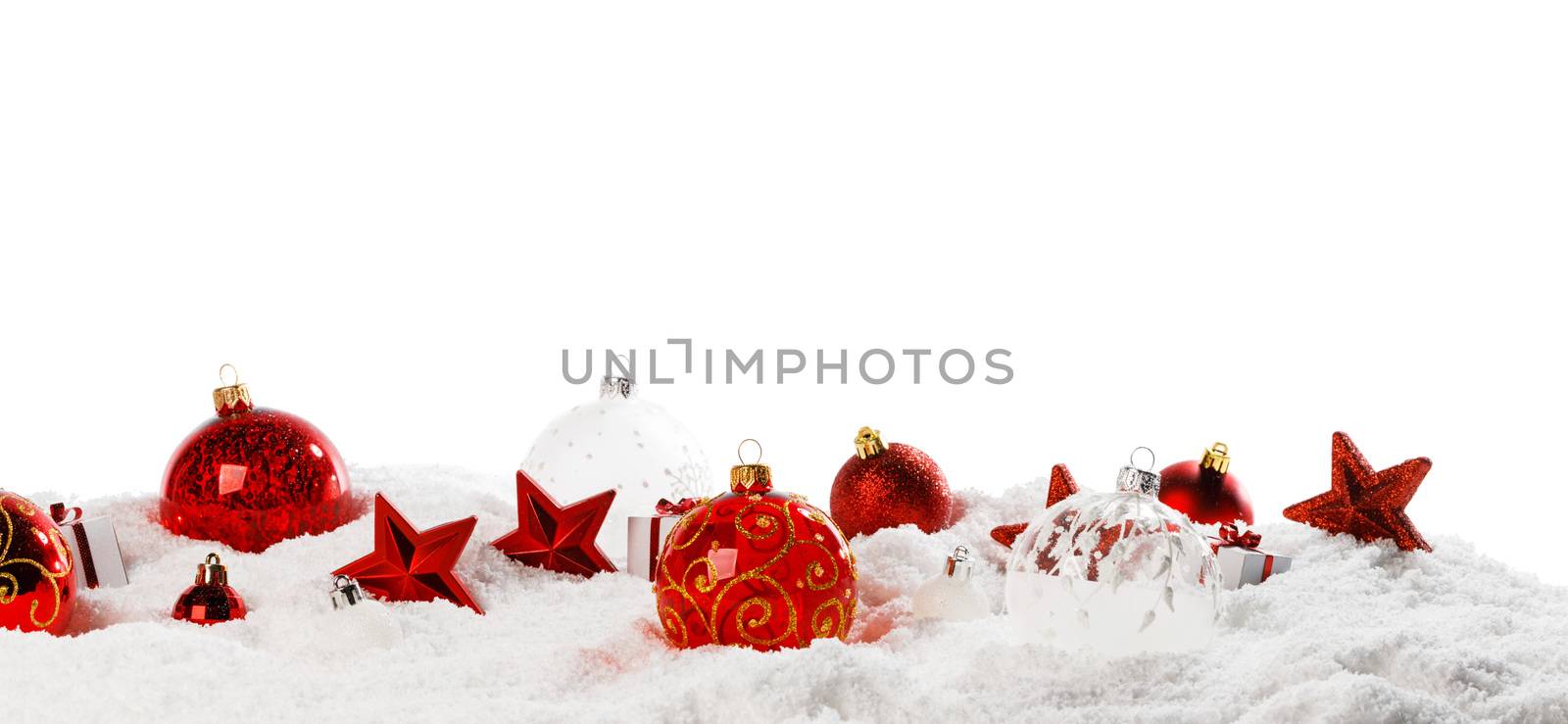 Christmas decoration frame of balls stars and gifts in snow in a row isolated on white background copy space for text design element