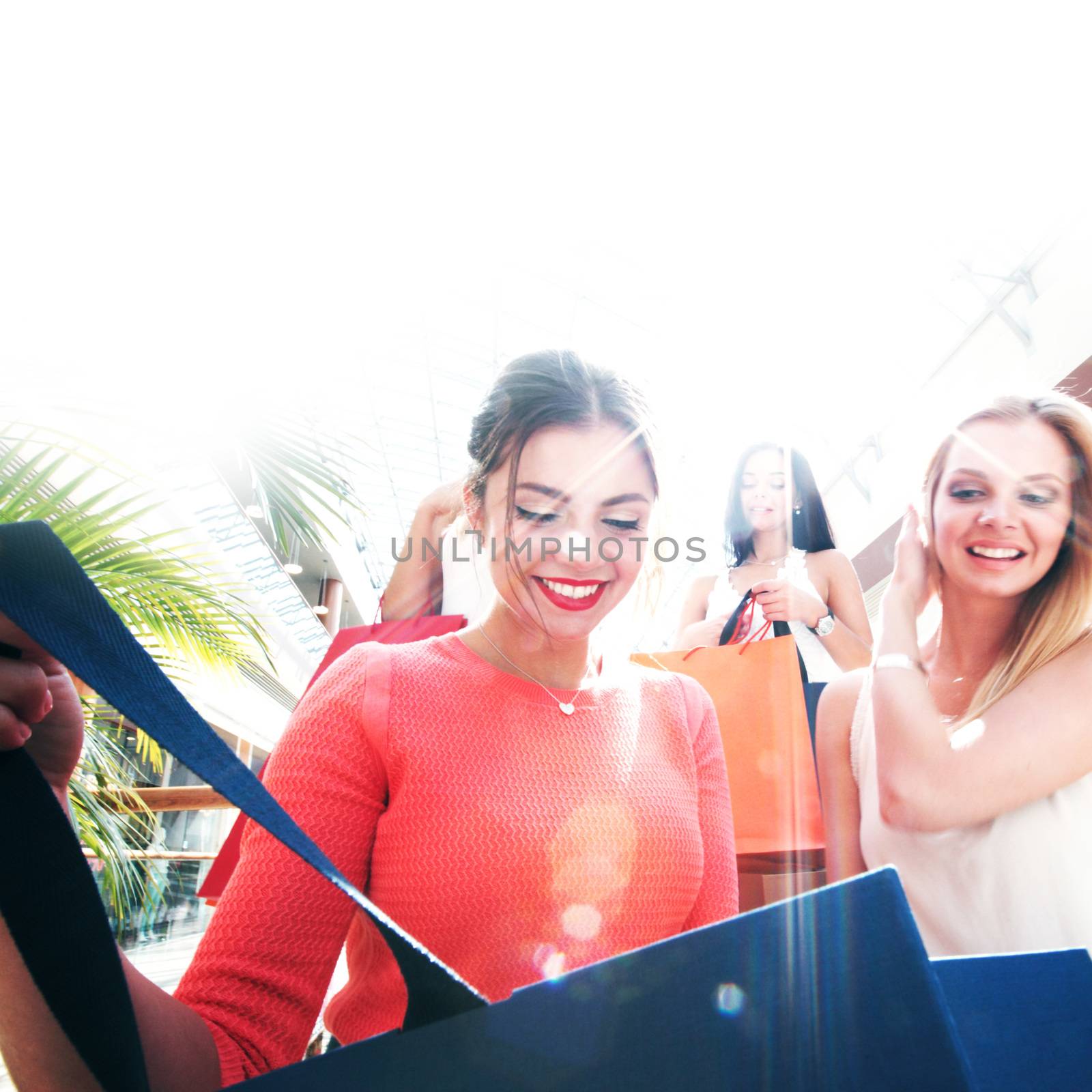 beautiful young women shopping at mall