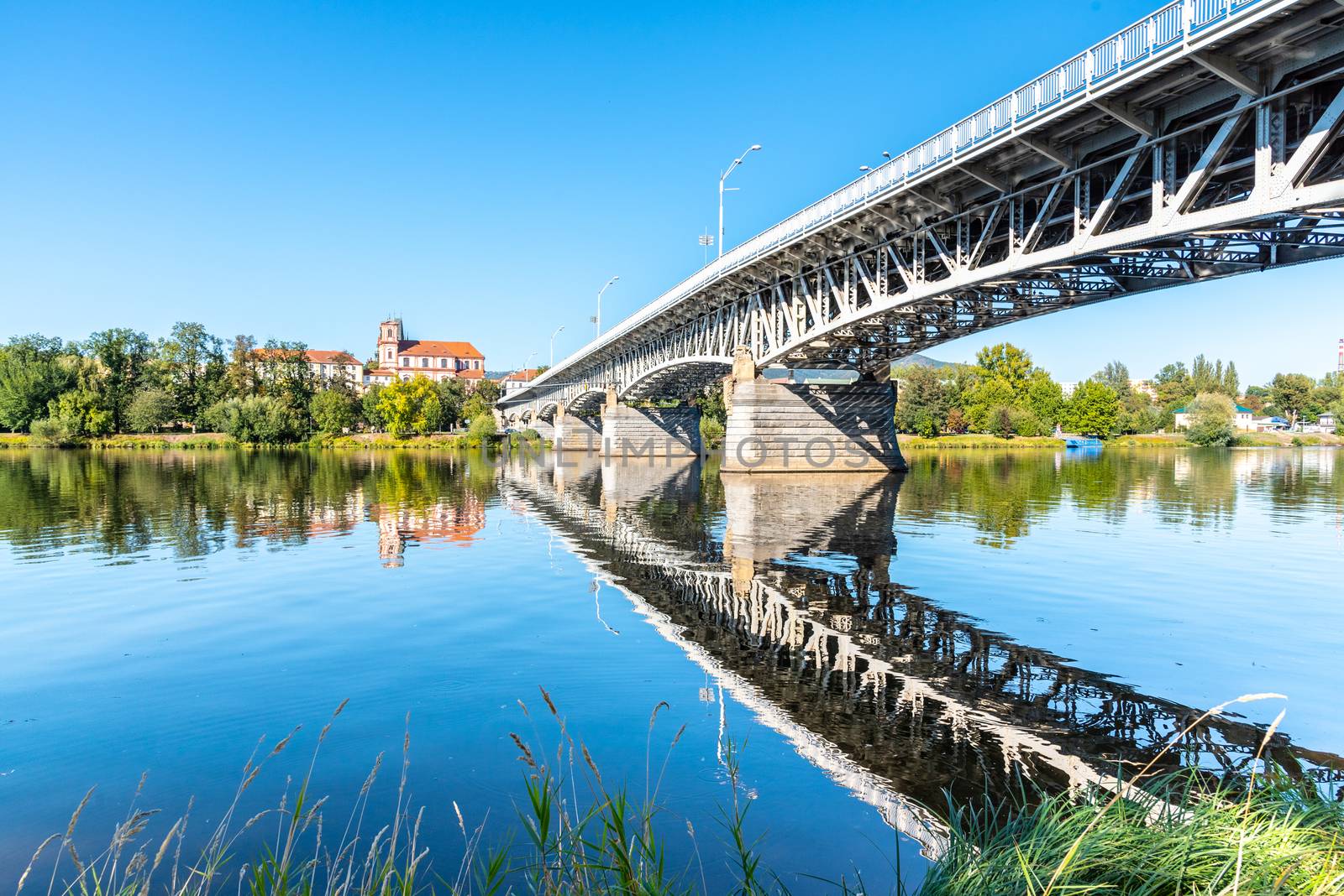 Tyrs Bridge over Labe River in Litomerice on sunny summer day, Czech Republic by pyty