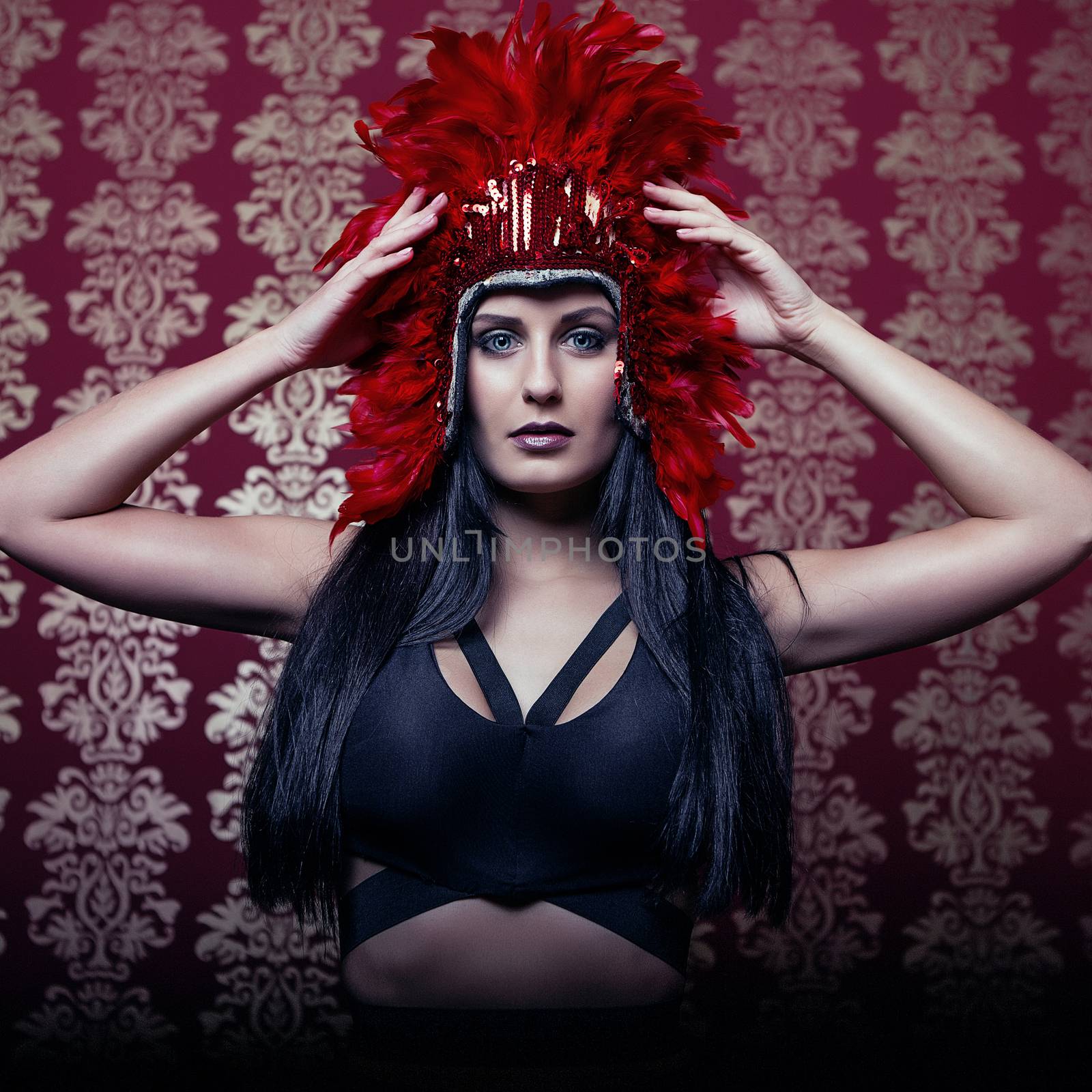 dark attractive girl with red carnival mask
