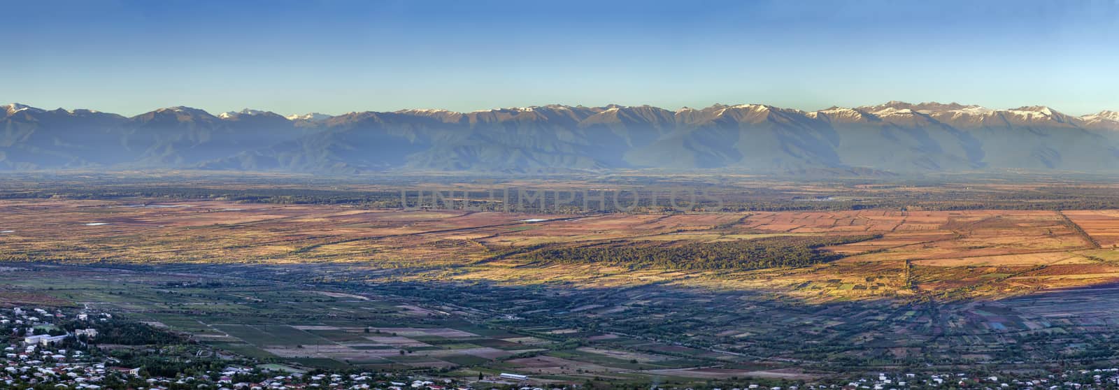 Panoramic view of Alazani valley and Caucasus Mountains from Sighnaghi, Kakheti, Georgia