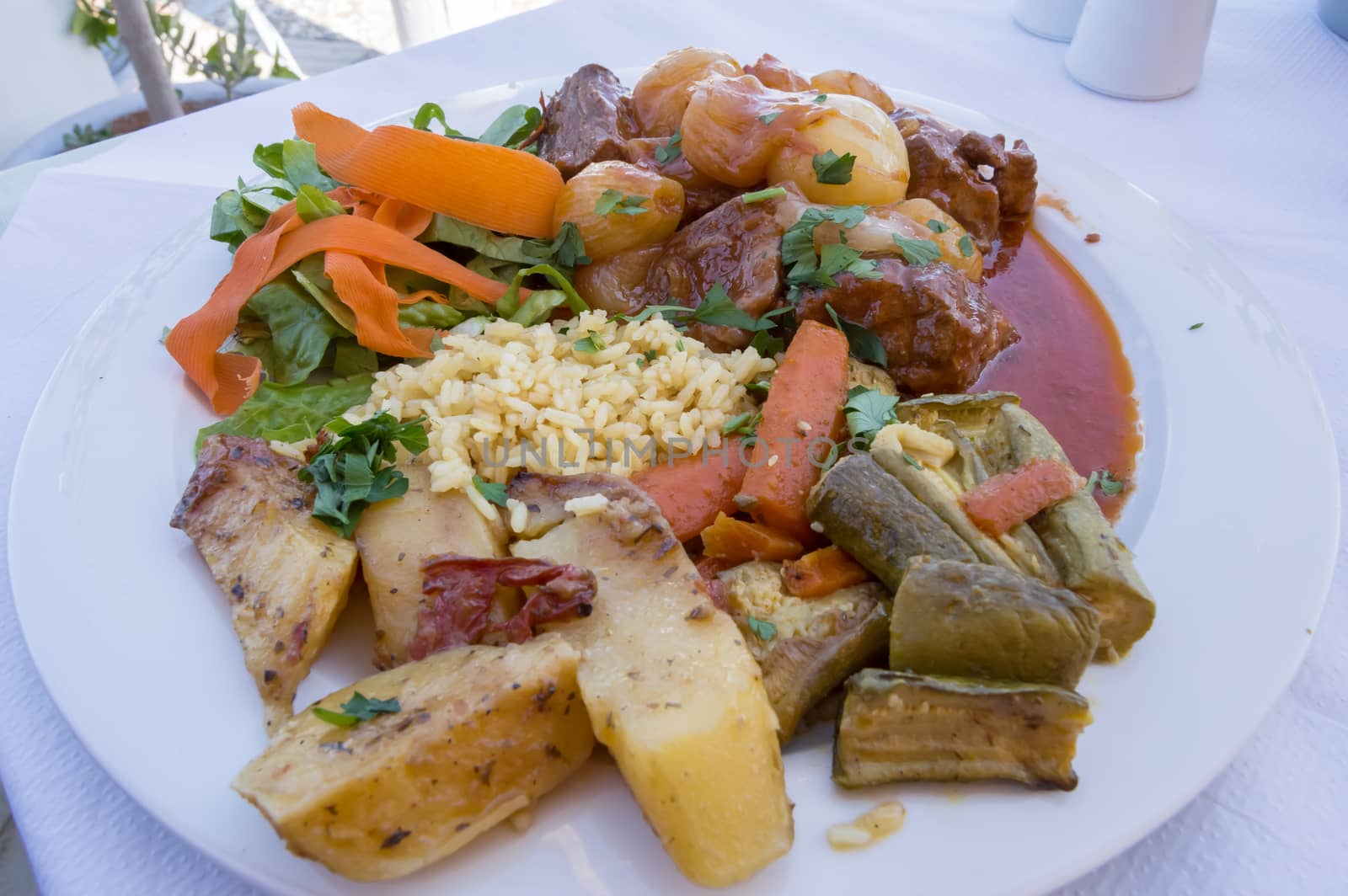 Plate of veal (stifado) prepare with onions by Philou1000