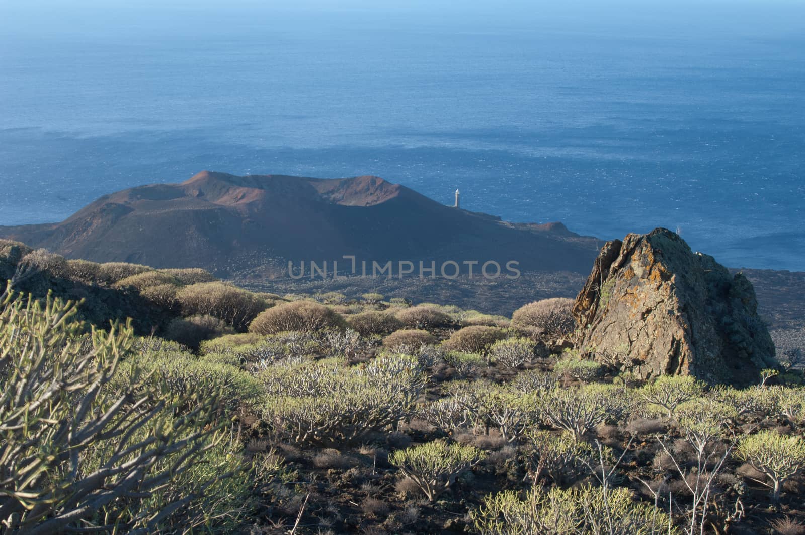 Landscape with the Orchilla lighthouse in the background. by VictorSuarez