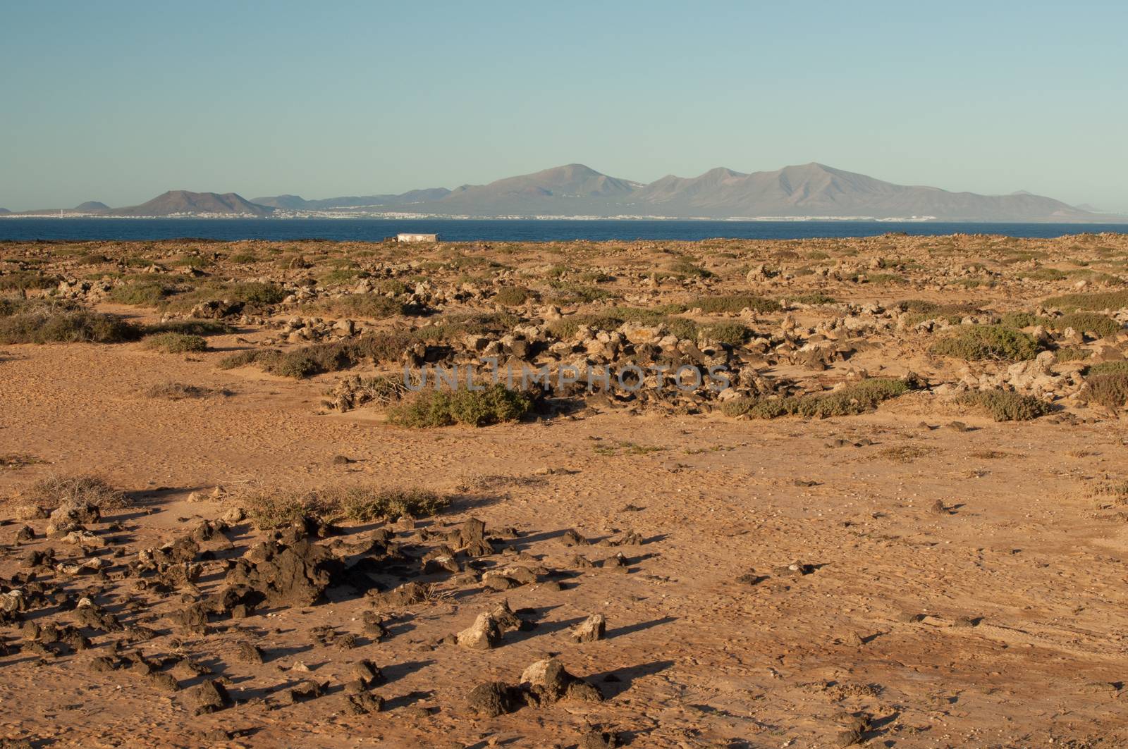 Majanicho and island of Lanzarote (south) in the background. La Oliva. Fuerteventura. Canary Islands. Spain.