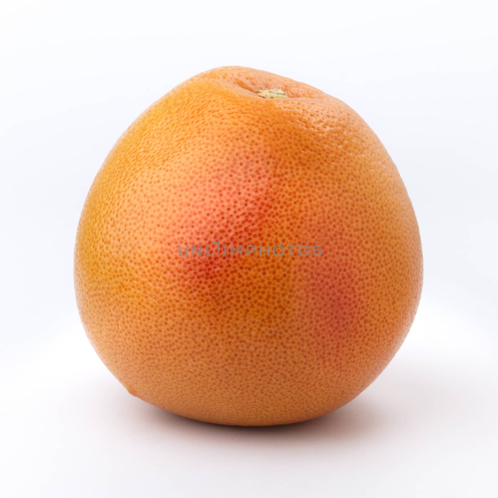 big pink  grapefruit isolated on white background