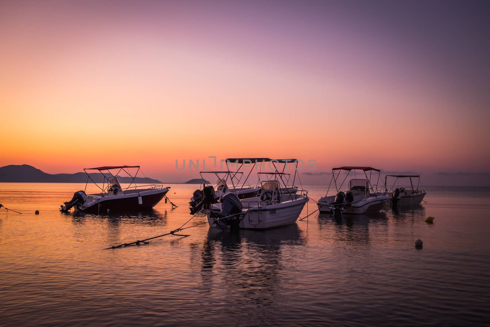 Beautiful sunrise in the little harbor on the island of Zakynthos, Greece. Agios sostis.