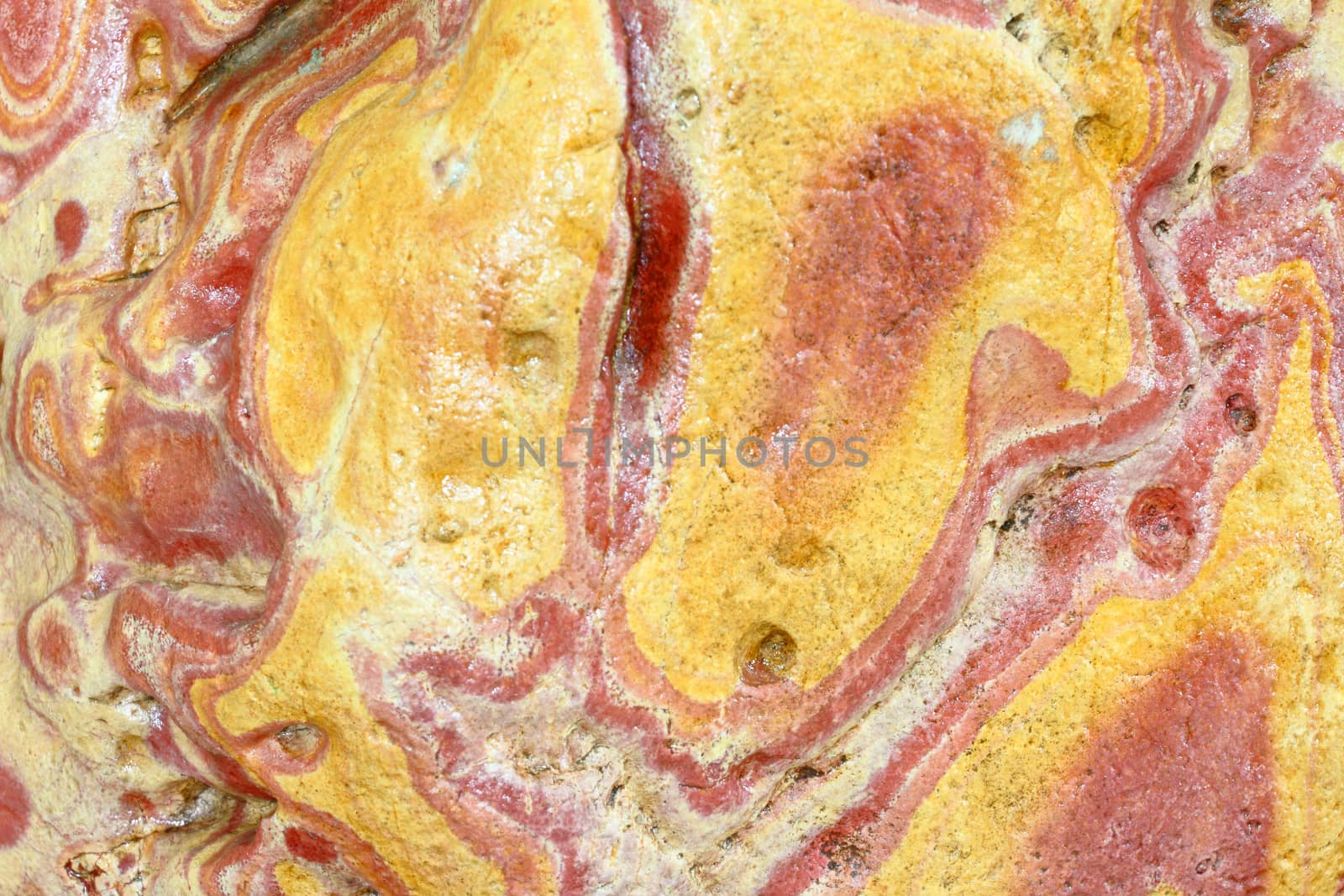 Multicolor surface of mineral stone, textured background 