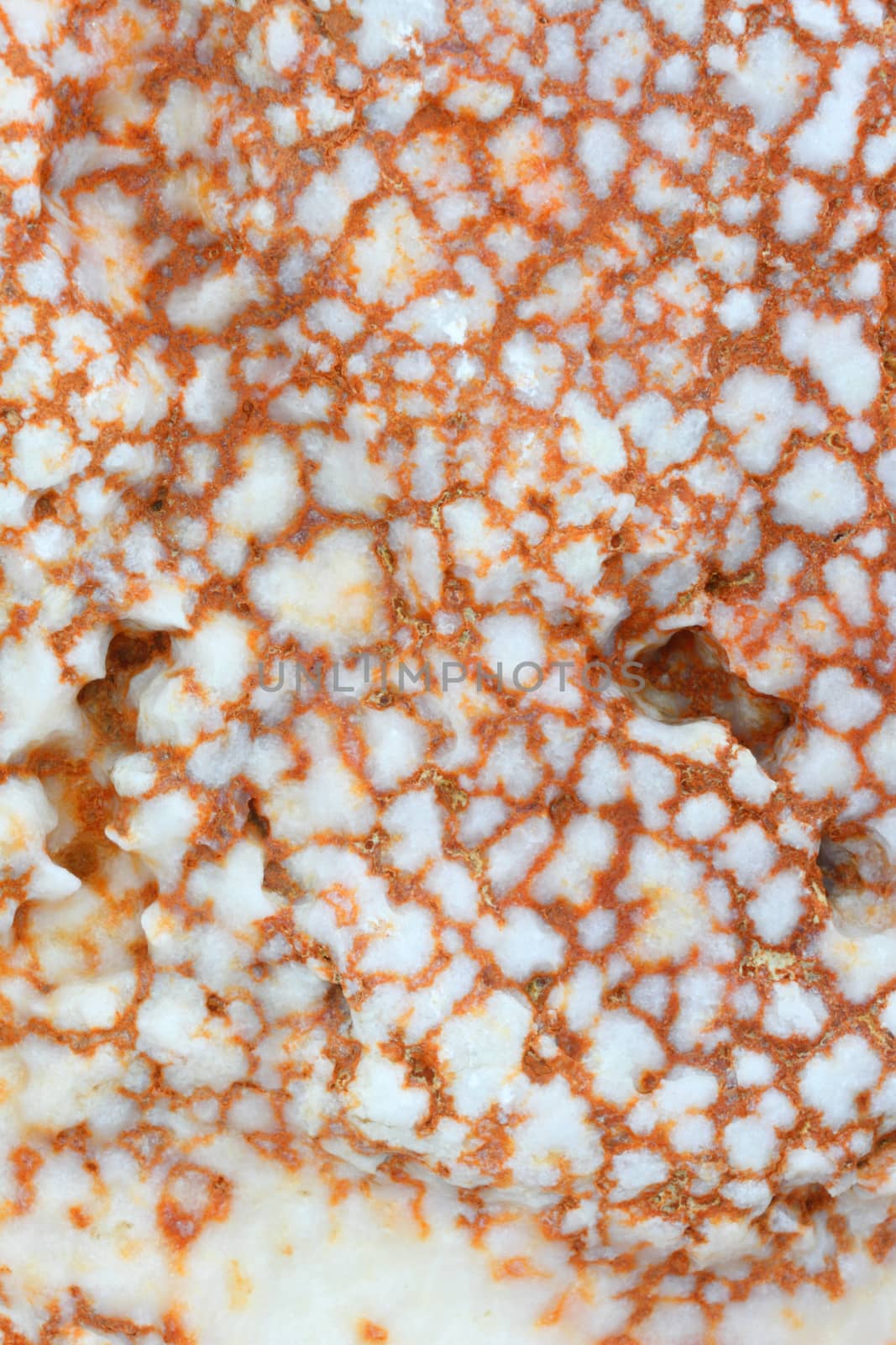 Close up multicolor surface of mineral stone, textured background 