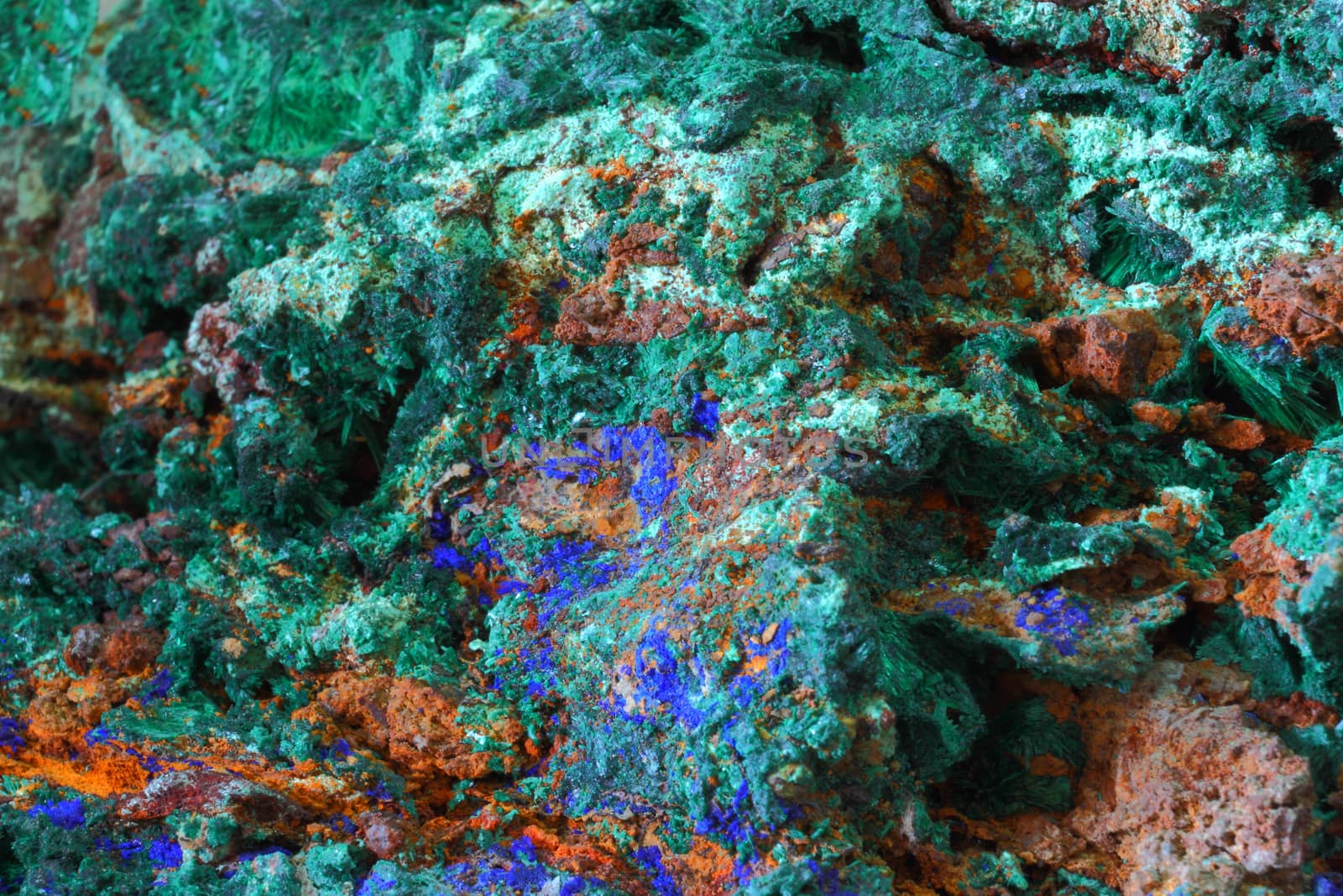 Multicolor surface of mineral stone, textured background 