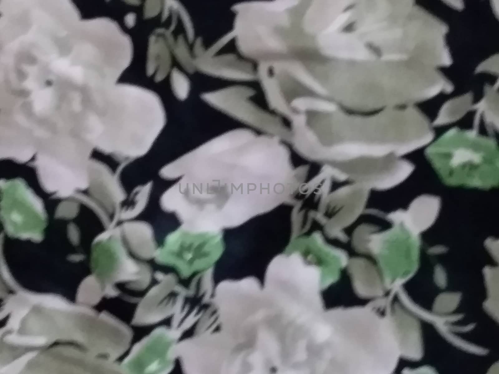 rose textile design on black background