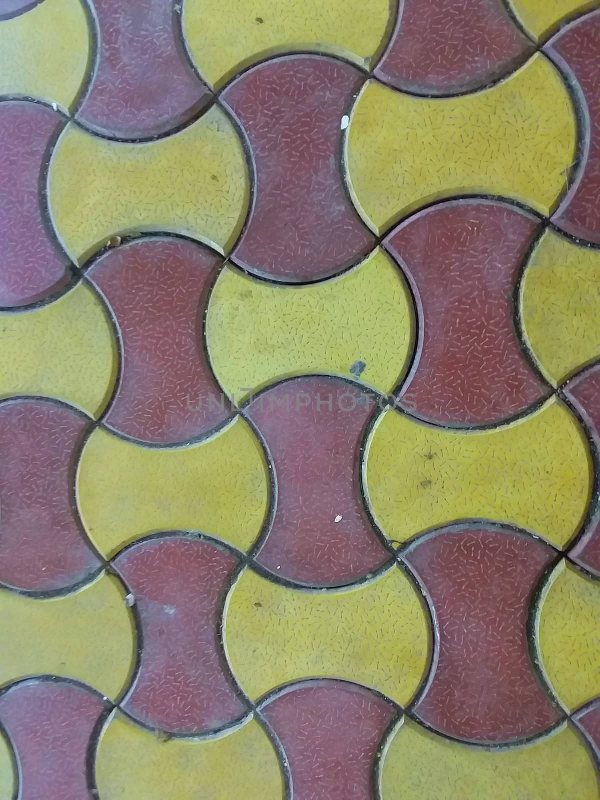 red and yellow ceramic design on tiles by gswagh71