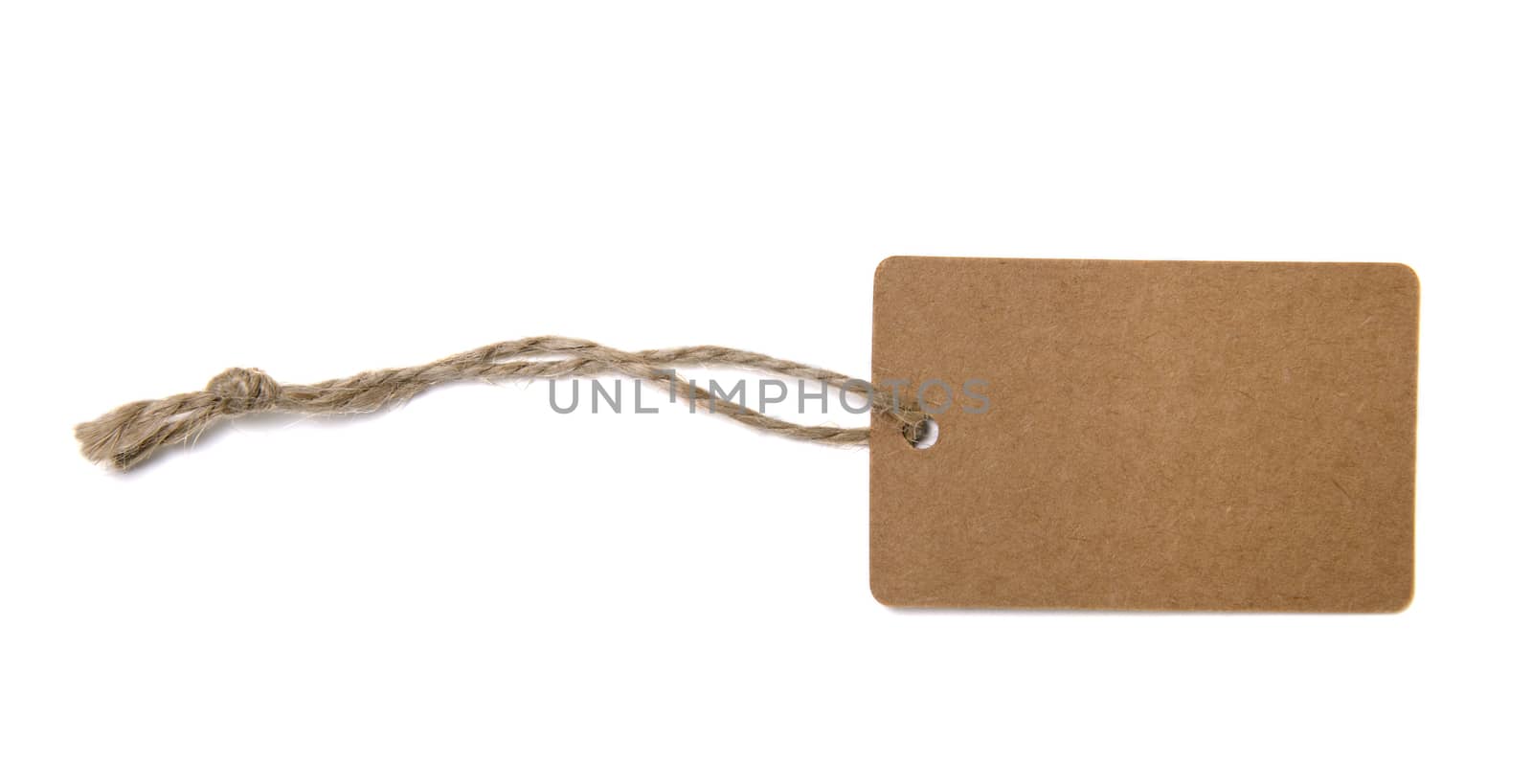 Blank tag tied with brown string isolated against a white background