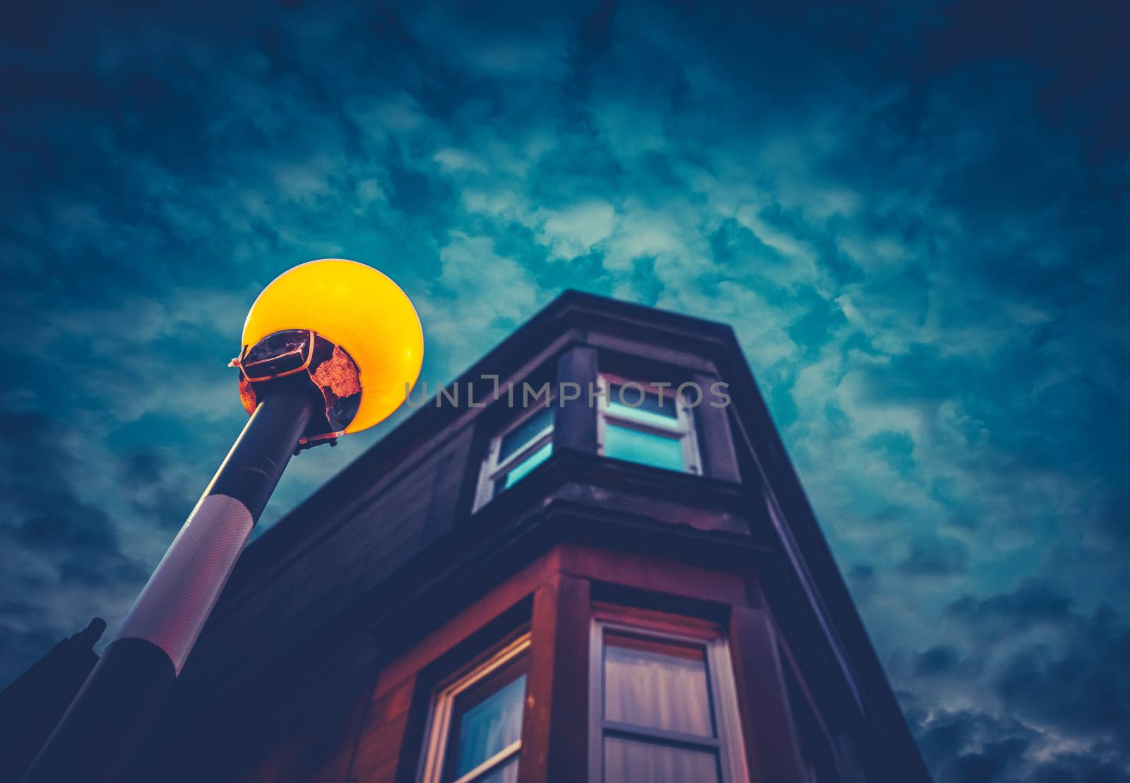 A Belisha Beacon Outside A Flat At Night In A Residential Area Of A British City