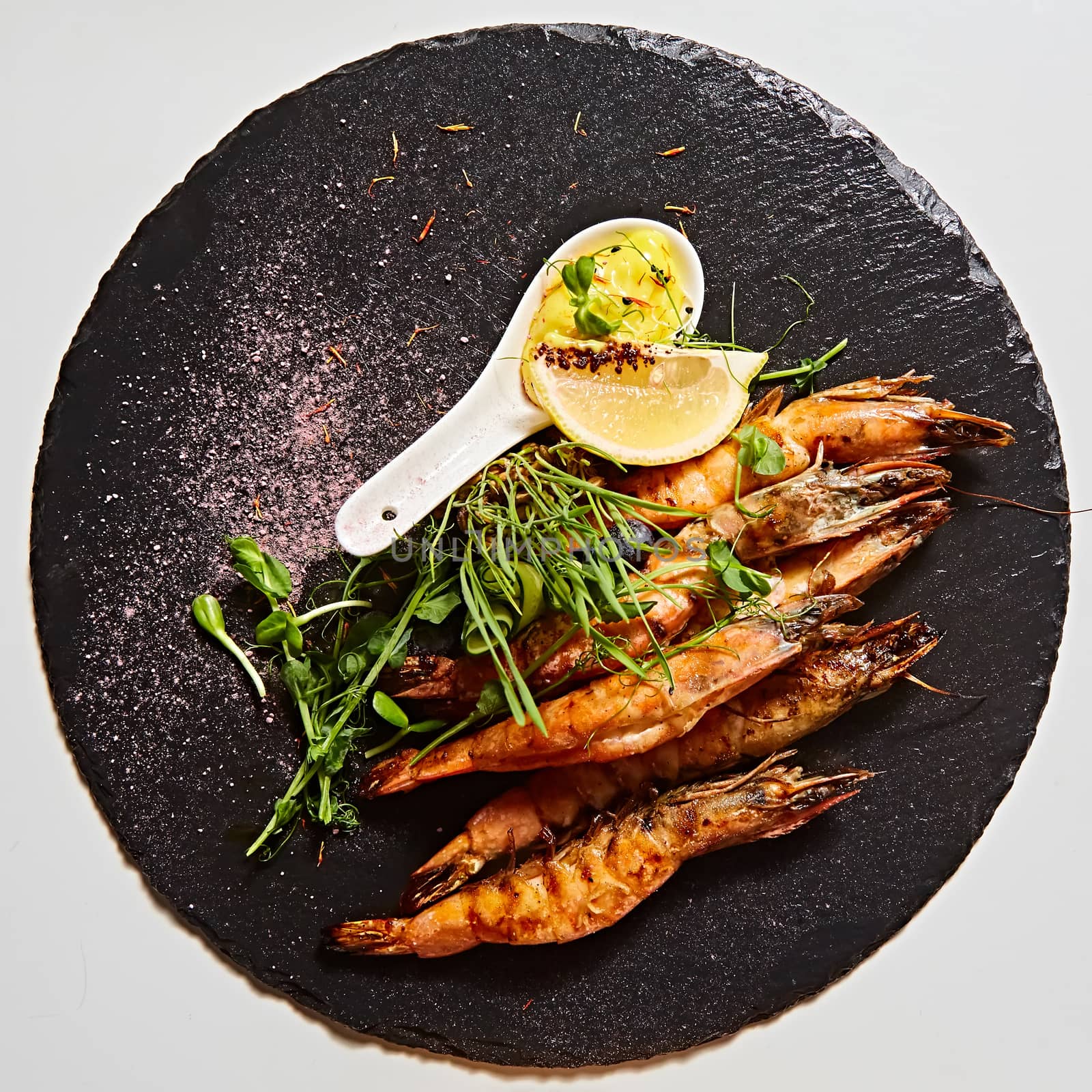 Grilled shrimp skewers. Seafood, shelfish. Shrimps Prawns skewers with herbs, garlic and lemon. by sarymsakov