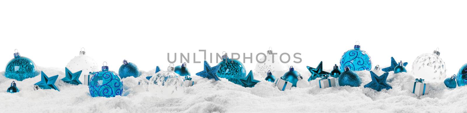 Christmas border with blue ornaments on snow isolated on white background