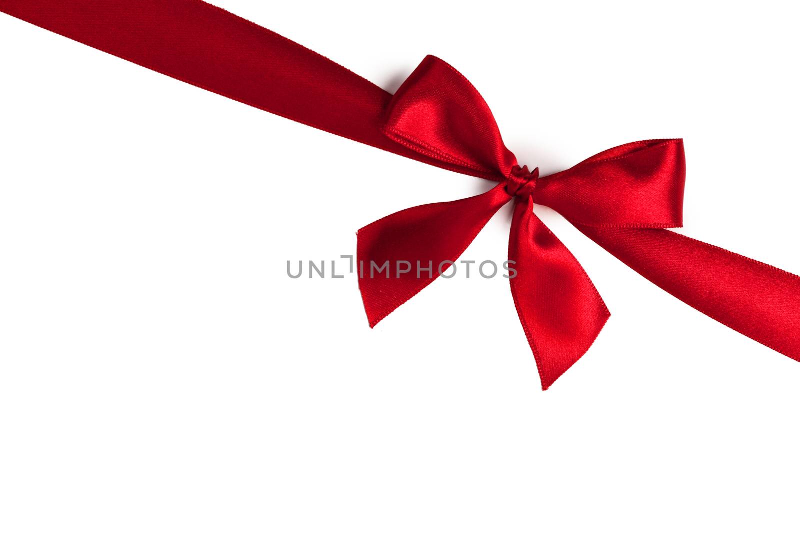 Red gift bow isolated on white background